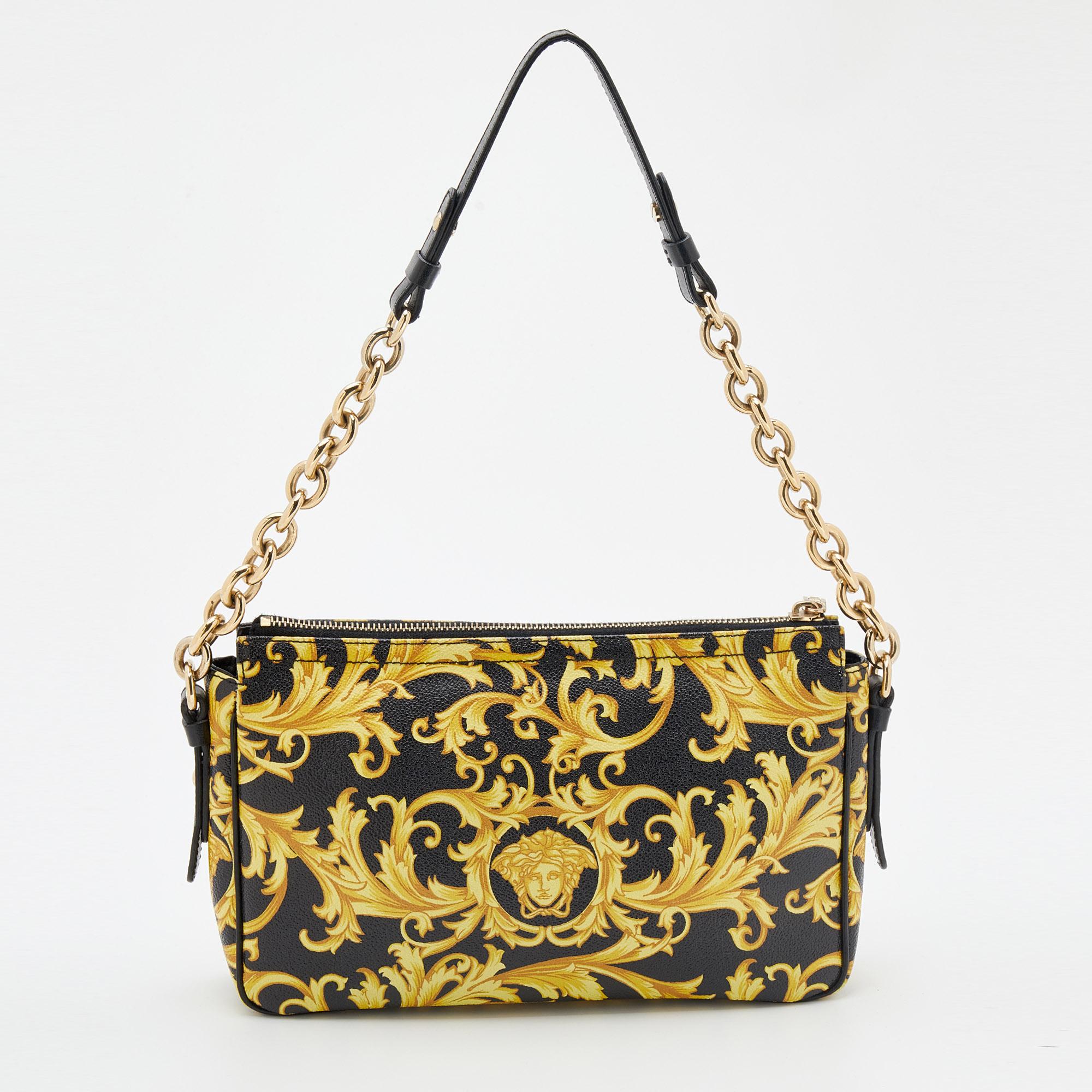 This shoulder bag from the House of Versace exudes the right amount of class and elegance. Crafted from black-yellow Barocco Medusa printed leather, this bag is adorned with a chain strap and gold-toned hardware. It accommodates a roomy interior.