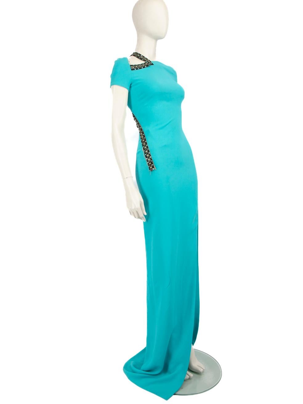 CONDITION is Good. Minor wear to dress is evident. Light signs of wear to overall dress, all embellished pieces are loose and coming off. Discolouration marks and areas of pilling are seen throughout the whole exterior on this used Versace designer