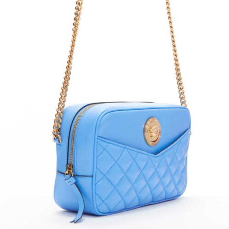 VERSACE blue lambskin leather quilted gold Medusa chain crossbody bag Medium
Reference: TGAS/D00819
Brand: Versace
Designer: Donatella Versace
Model: 1008828 1A03912 1V57V
Collection: Tribute
Material: Lambskin Leather, Metal
Color: Blue,