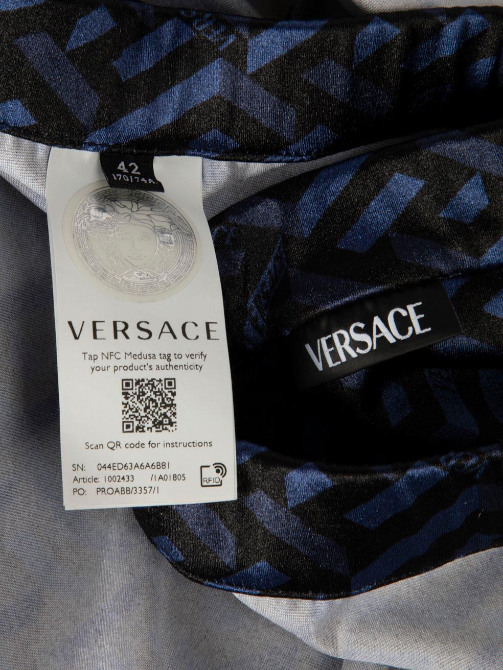 Leggings bleus à motif de logo Versace Taille M Pour femmes en vente