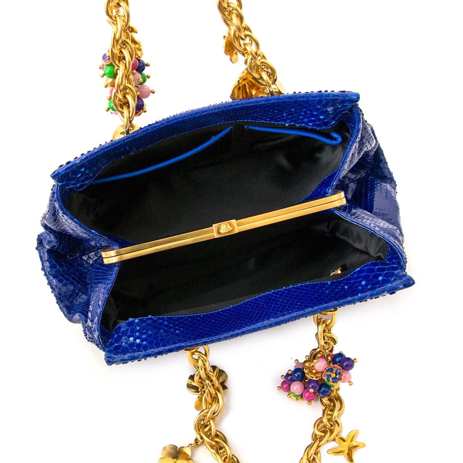 blue bag with gold chain