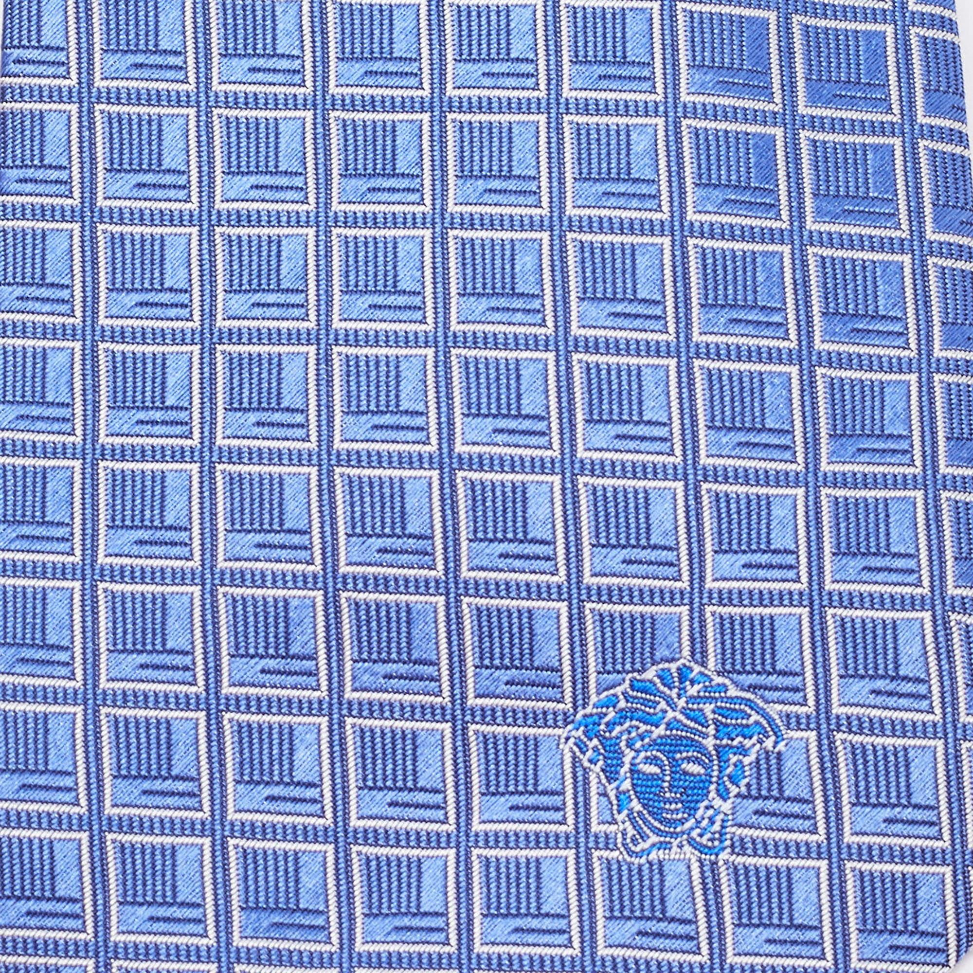 Pick this Versace tie to give your formal look a touch of luxury. It is cut from silk and detailed with patterns all over. It is finished with the brand label on the back.