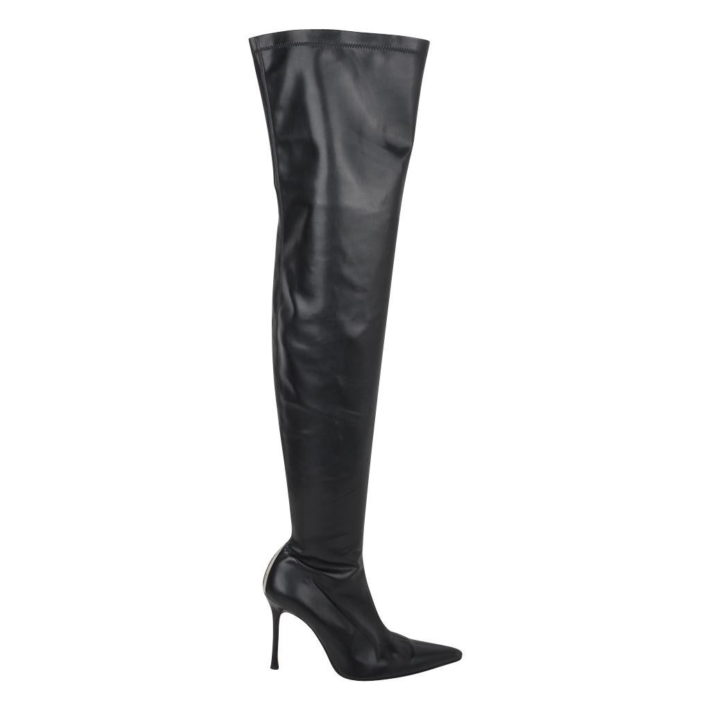 Guaranteed authentic Versace sensational butter soft black thigh high pull on boots.
Rear of foot has metal V embossed Versace.
Pointed toe and stiletto heel.
Inside zip at ankle.
final sale

SIZE  39
USA  9

BOOT MEASURES: 
TALL 25