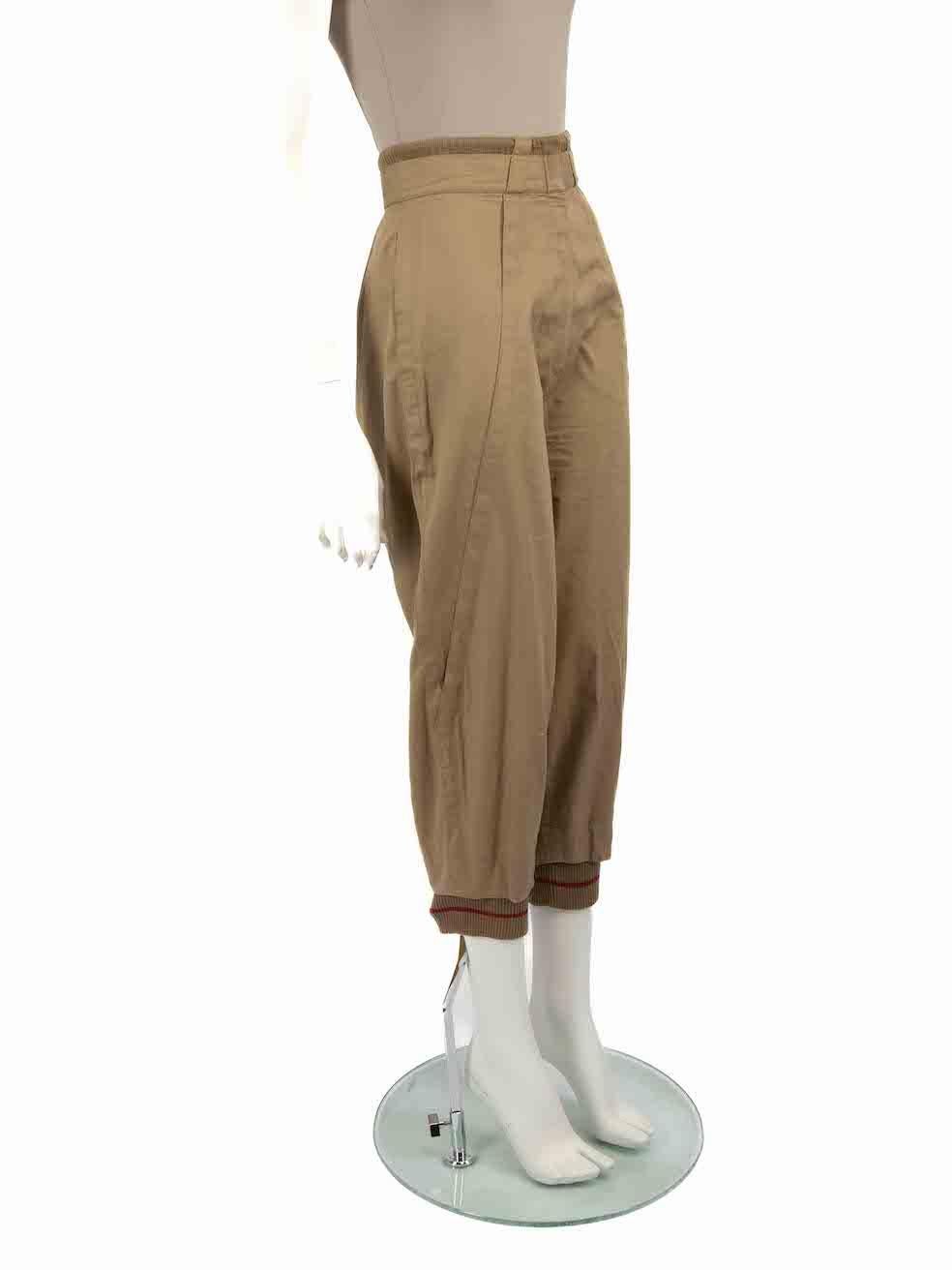 CONDITION is Very good. Minimal wear to trousers is evident. Minimal wear to waistband where there are minor plucks to the weave and a small mark to the right leg back on this used Versace designer resale item.
 
 
 
 Details
 
 
 Brown
 
 Cotton
 
