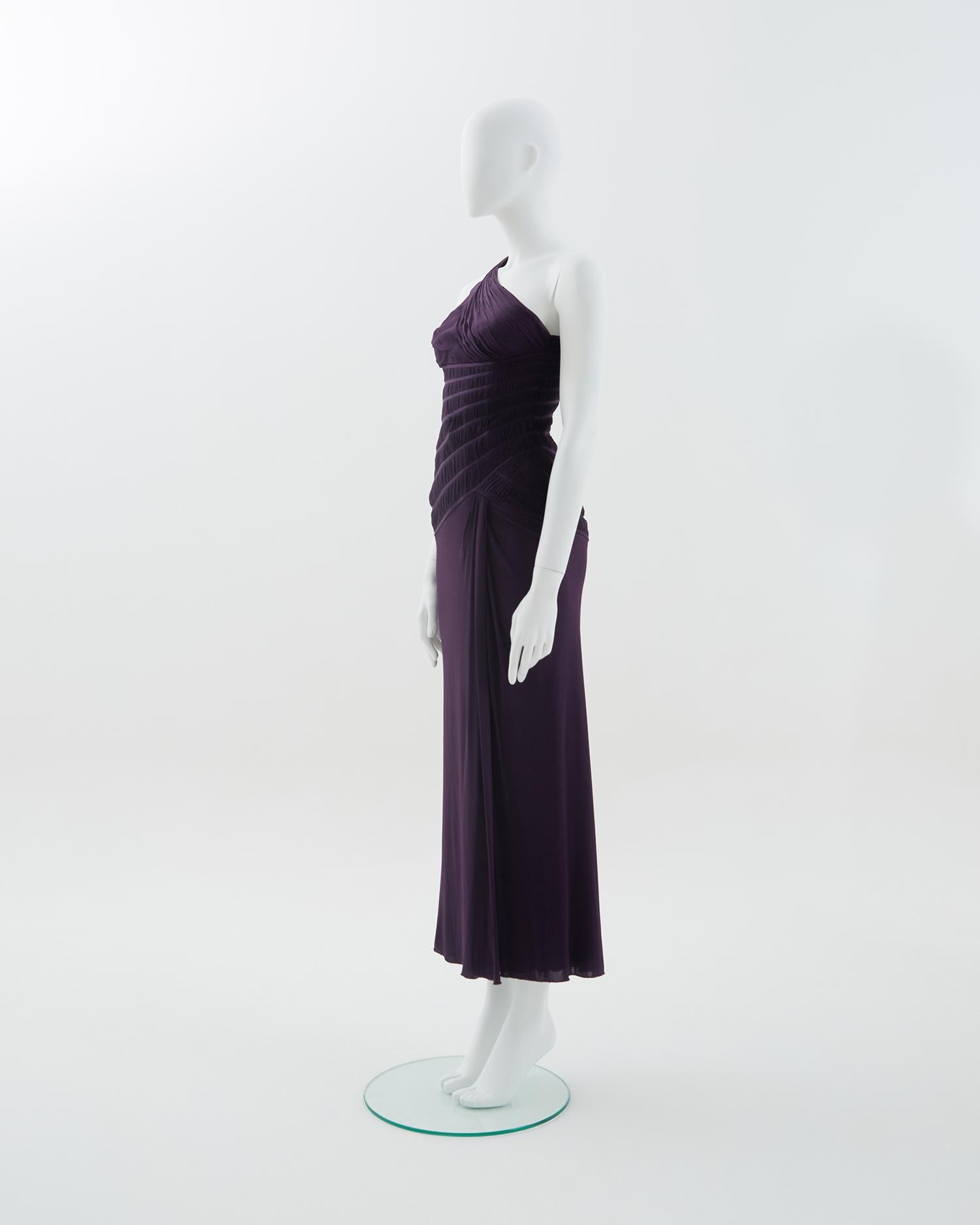 - Designed by Donatella Versace
- Sold by Skof.Archive
- Pre-Fall 2008
- Purple stretch Versace gown 
- Slinky one shoulder 
- High-slit dress debuted on the season's runway as look 32
- Drape details at the shoulder straps and hips 
- Made in Italy
