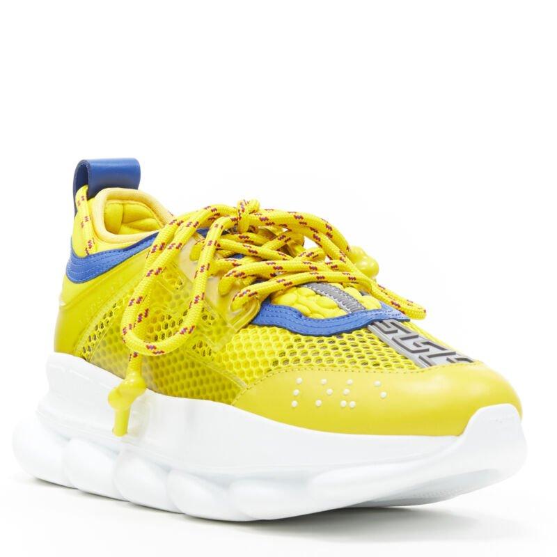 VERSACE Chain Reaction yellow blue low top chunky sole dad sneaker EU38 US8
Reference: TGAS/A05134
Brand: Versace
Designer: Donatella Versace
Model: Versace Chain Reaction
Collection: Runway
Material: Fabric, Leather
Color: Yellow
Pattern: