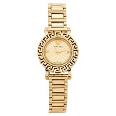 Versace Champagne Montre-bracelet pour femme Glam  Greca en acier inoxydable plaqué or 29 mm