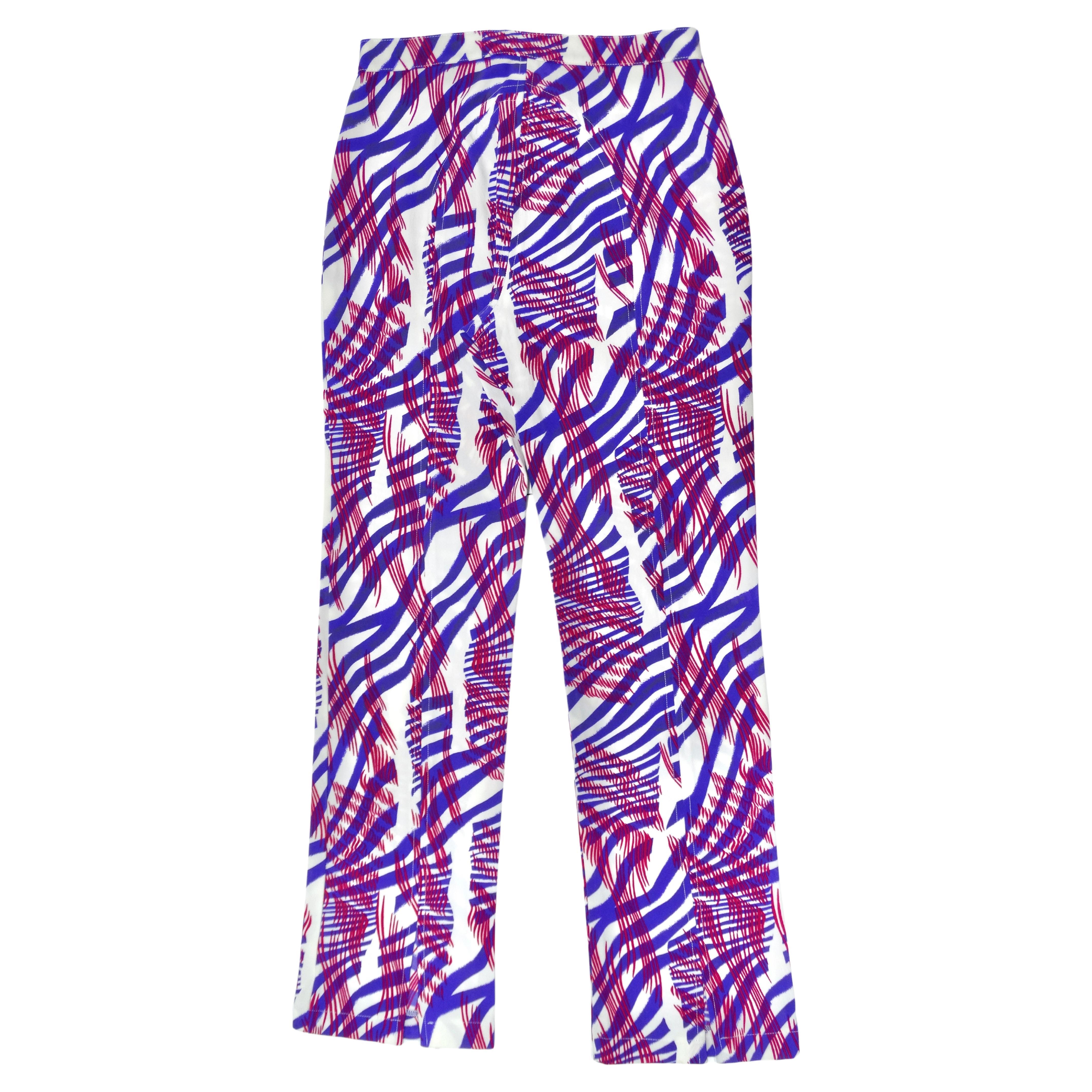 Add a little funky Versace to your closet. This pants include a strechy fabric and button closure with a bold purple and pink striped overlapping pattern. Take these through your everyday life as the fabric will never let you down. Pair these with a