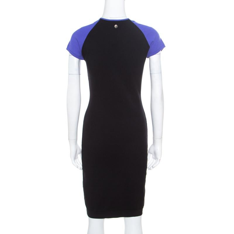 A splendid balance of comfort and style, this blended fabric dress is an apparel you must own. This Versace Collection dress has purple cap sleeves, jacquard detailing on the front, and a fitted design. It is bound to look amazing when worn with