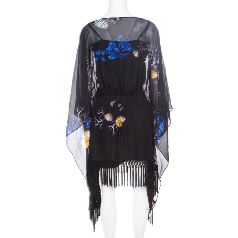 This beach Kimono from Versace Collection is a staple that deserves a place in every woman's dream closet. It is tailored from silk and features shell prints all over and tassels on the bottom. Overall, it has a soft, flowy feel.

