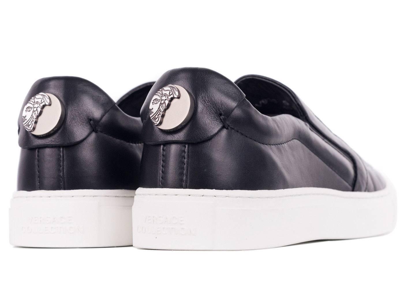 Walk amongst the stars in your Versace Collection Engraved Sneakers. These slip on sneakers  are very easy to wear and display luxury craftmanship. They feature an engraved star motif with concealed elastic bands and trendy white rubber soles for