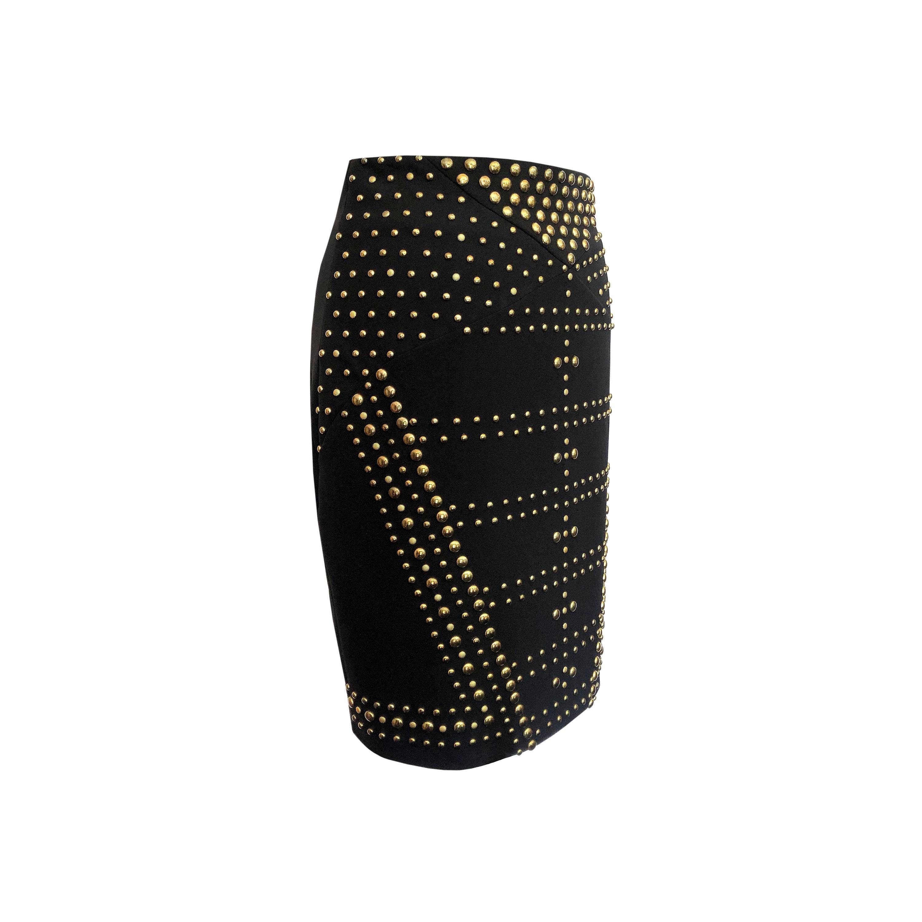 Product Details: Versace Skirt - Black Stretch Viscose + Brass Stud Detailing - Fully Lined - 'Versace Medusa' Logo Mirror Tag + Zipper Fasten / Back Skirt - Back Panel Detailing
Label: Versace Collection
Size: IT 42 (Fits UK 8 to UK 12)
Fabric