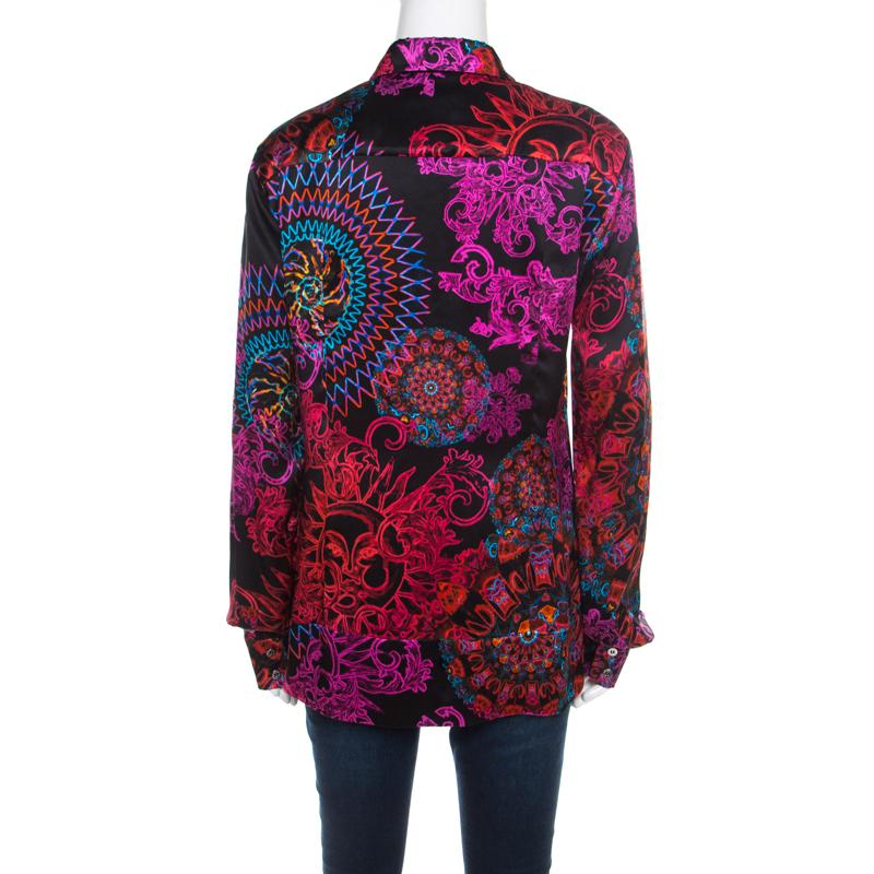 This shirt from Versace Collection is comfortable to wear. The silk shirt comes with colourful prints all over. It features a simple collar, front button fastenings, and cuffed sleeves. A pair of black trousers and pumps will complete the look