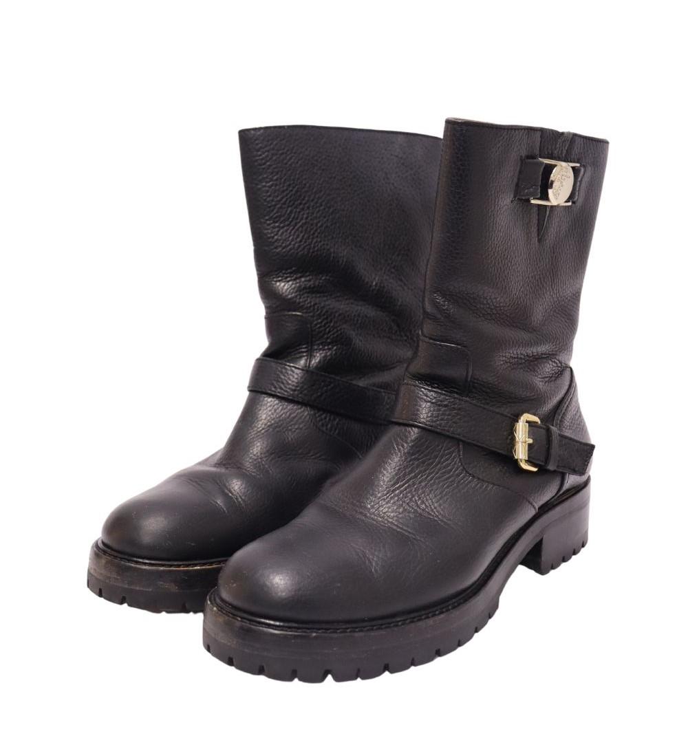 Versace Collection Pebbled Leather Moto Boots, features a round-toe, ankle length, chunky sole and slip on style.

Material: Leather
Size: EU 40
Heel: 4cm
Overall Condition: Excellent
Interior Condition: Like New
Exterior Condition: Minor leather