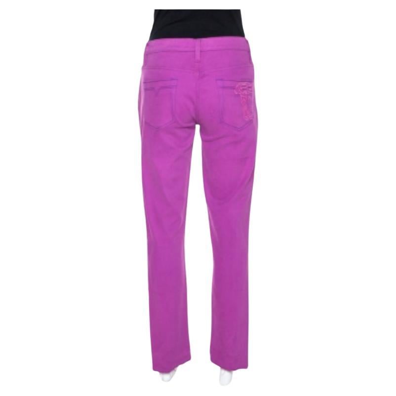 This pair of jeans by Versace Collection brings embroidery on one of the back pockets for a signature effect. It is made from a cotton blend and designed with belt loops, pockets and button closure. The purple jeans are a great choice.