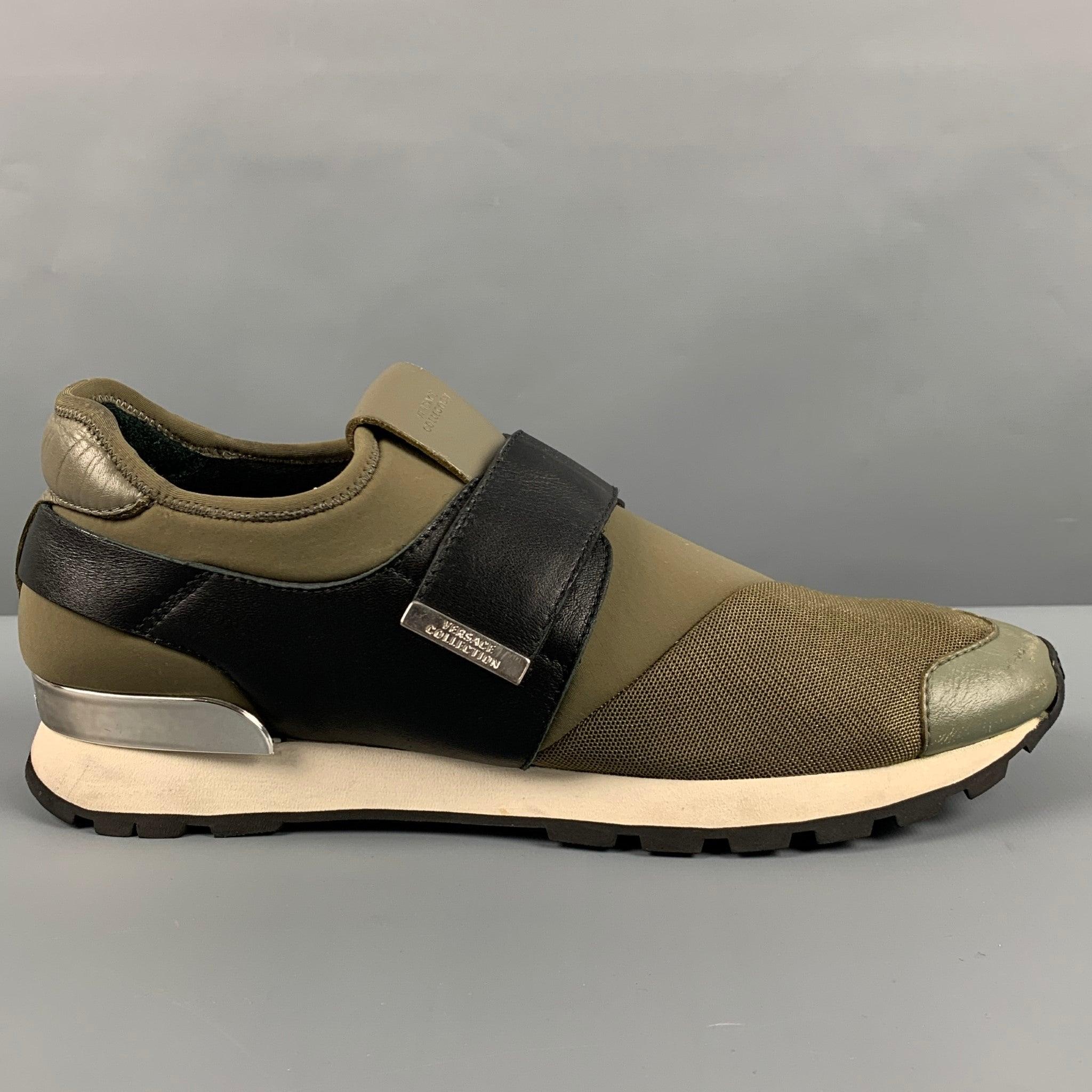 VERSACE COLLECTION sneakers
in a
green neoprene fabric featuring a color block style, black leather trim, and self-fastening closure. Made in Romania.Very Good Pre-Owned Condition. Moderate signs of wear. 

Marked:   43Outsole: 11.75 inches  x 4.25