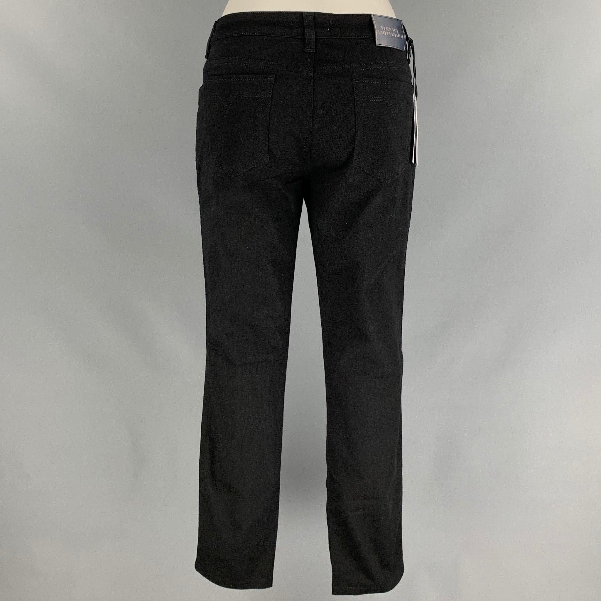 VERSACE COLLECTION Size 24 Black Cotton Blend Studded Skinny Casual Pants In Good Condition For Sale In San Francisco, CA