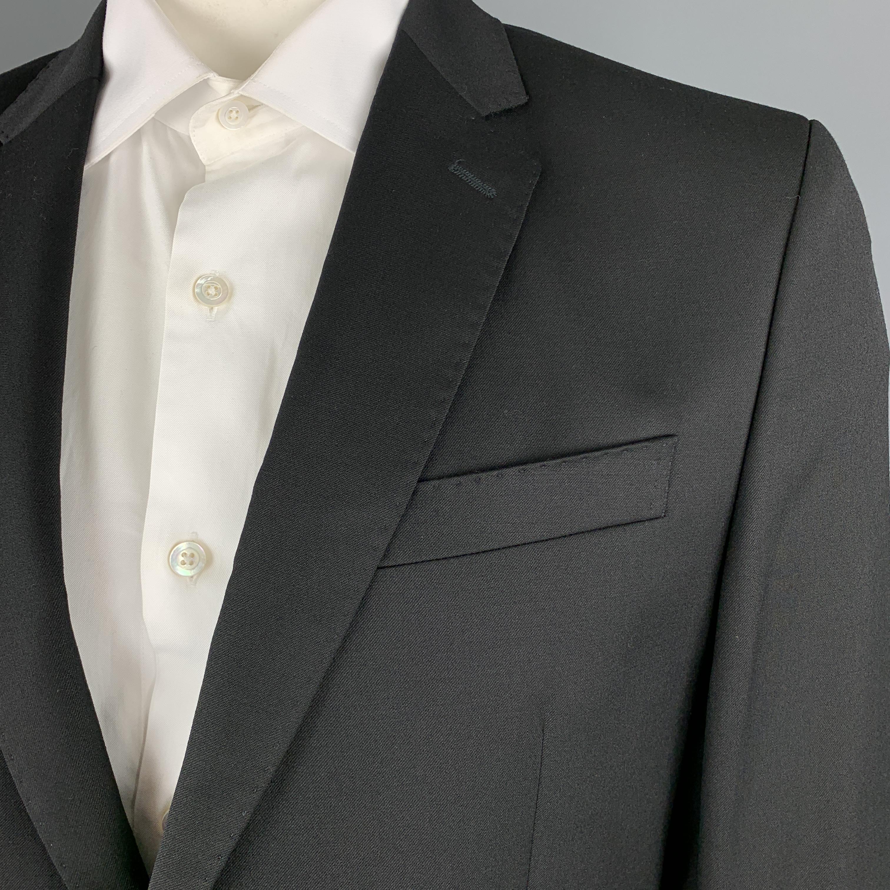 VERSACE COLLECTION sport coat comes in black wol twill with a notch lapel, single breasted, two button front, and top stitching throughout. Made in Bulgaria.

Brand New.
Marked: IT 52

Measurements:

Shoulder: 18 in.
Chest: 44 in.
Sleeve: 26