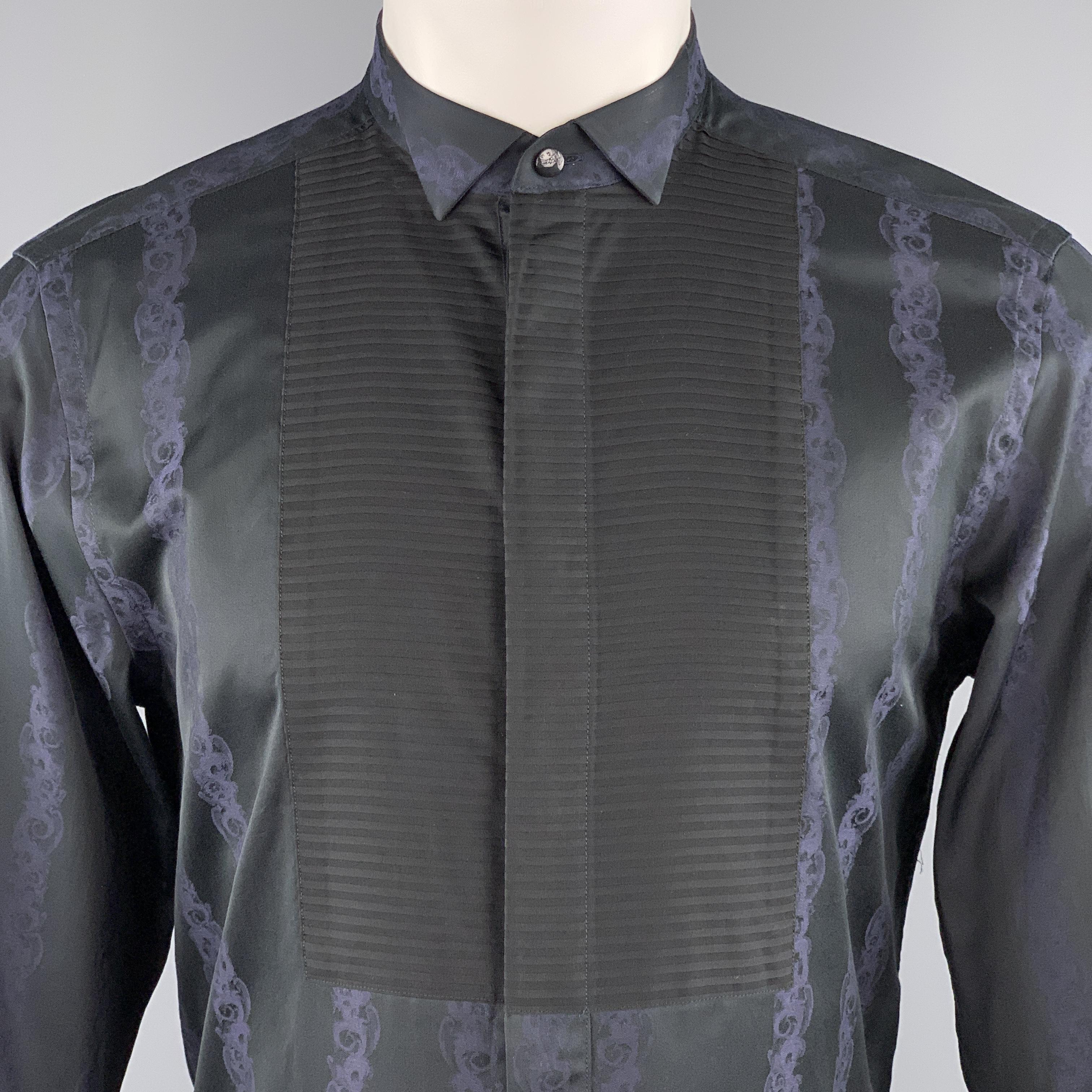 VERSACE COLLECTION tuxedo shirt comes in black and navy stripe print cotton with a hidden placket button up front, pleated bib panel, and stand up collar. 

Excellent Pre-Owned Condition.
Marked: 15 1/4  40

Measurements:

Shoulder: 16.5 in.
Chest: