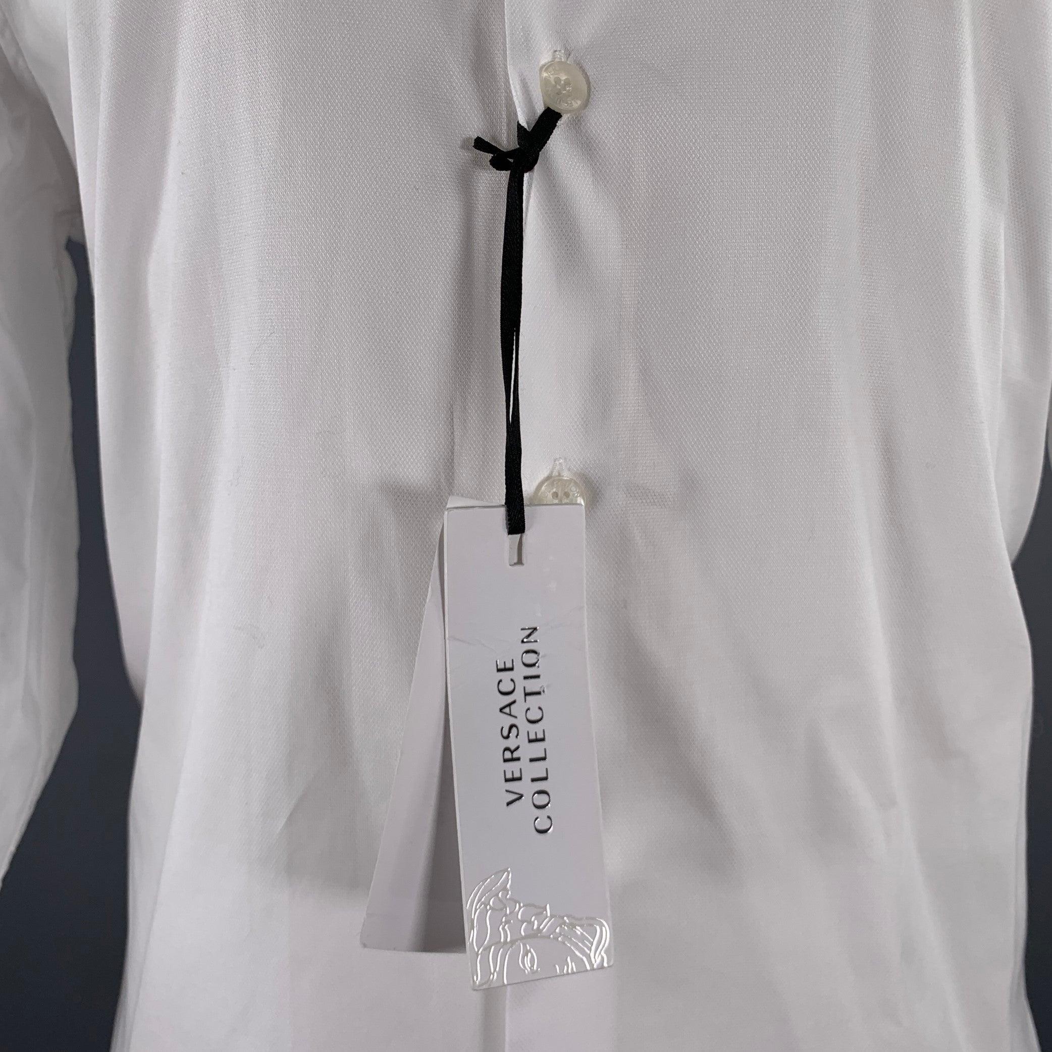 VERSACE COLLECTION long sleeve shirt
in a white cotton woven fabric featuring spread collar, and button closure. New with Tags. 

Marked:   41 

Measurements: 
 
Shoulder: 16.5 inches Chest: 43 inches Sleeve: 26.5 inches Length: 30.5 inches 
  
  
