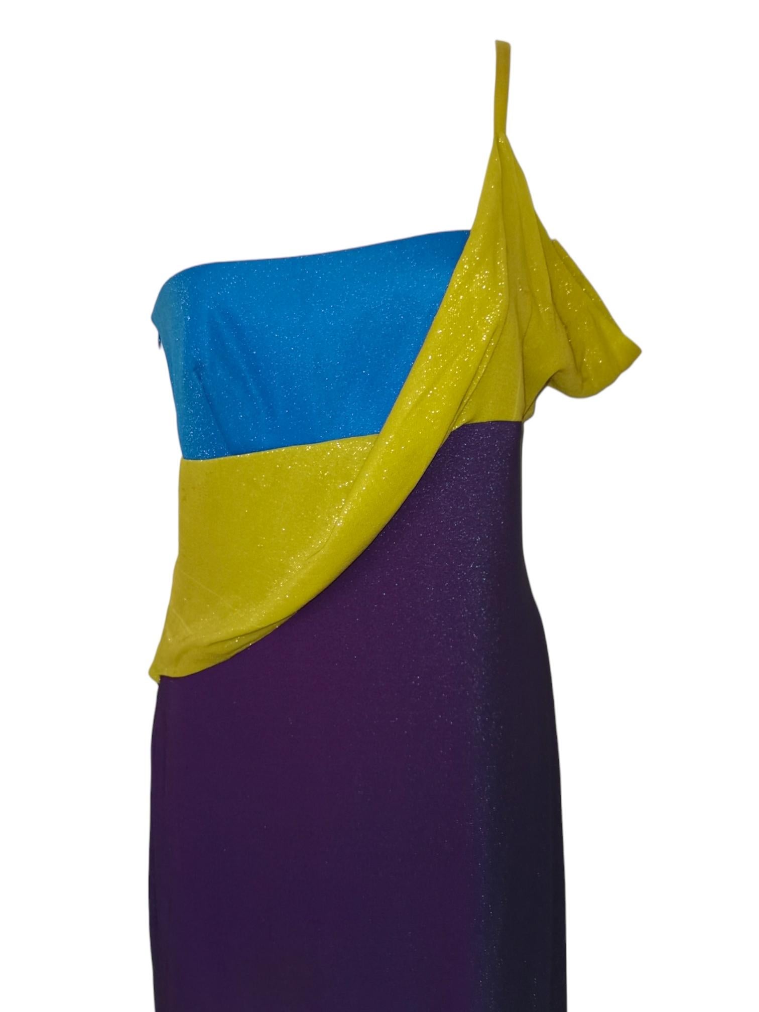 My Runway Archive presents this very rare runway gown from the Versace FW 1997 collection in the signature Versace colour block.
Material: Viscose, nylon, silk and acetate blend. 
Size: Label missing but fits like a UK size 8
Condition: Overall very