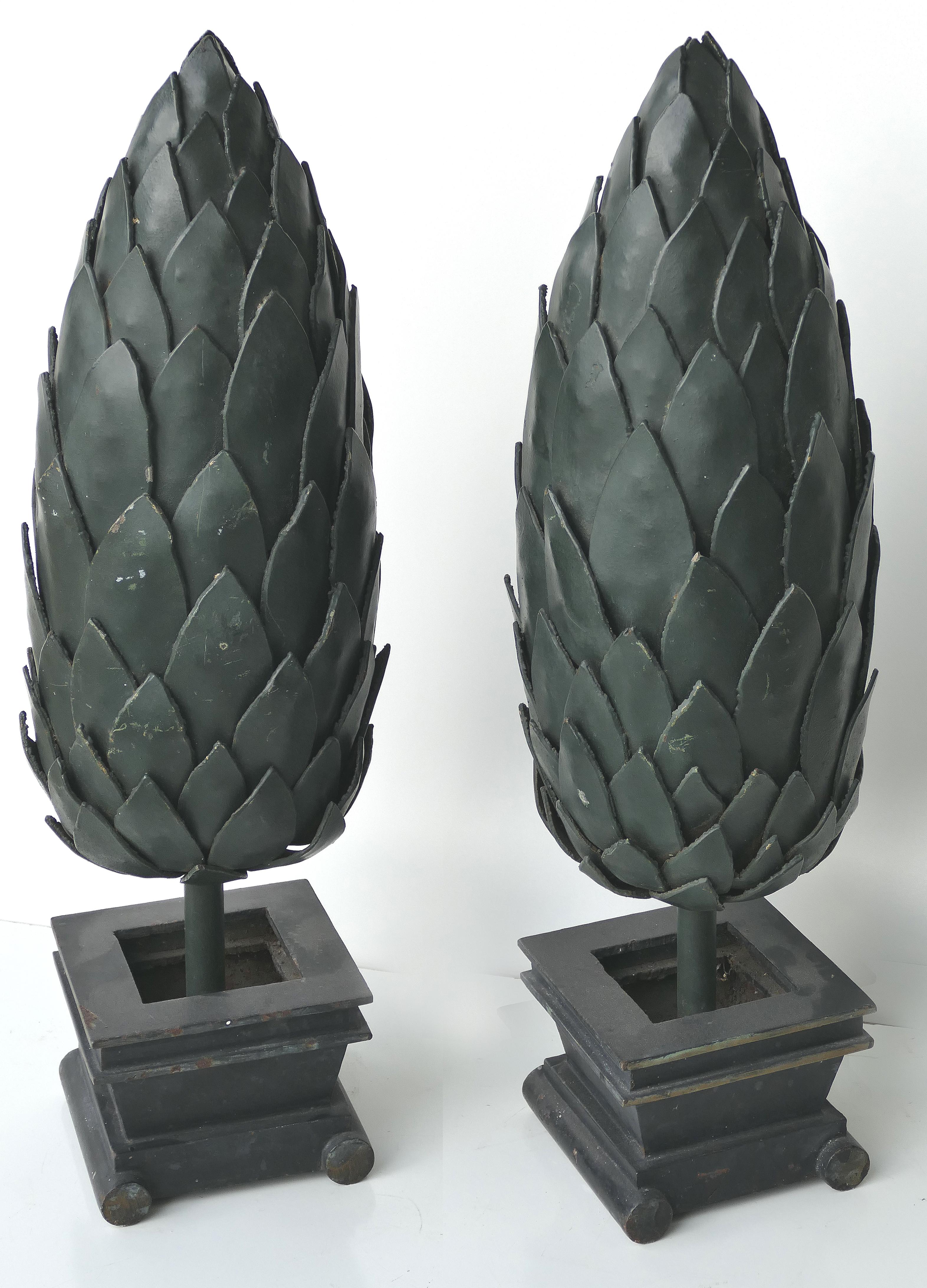 Versace commissioned pair of iron topiary sculptures


Offered for sale is a fabulous pair of vintage iron topiary sculptures that were originally commissioned for the Versace store in Miami Beach. These sculptures have matching planter bases and