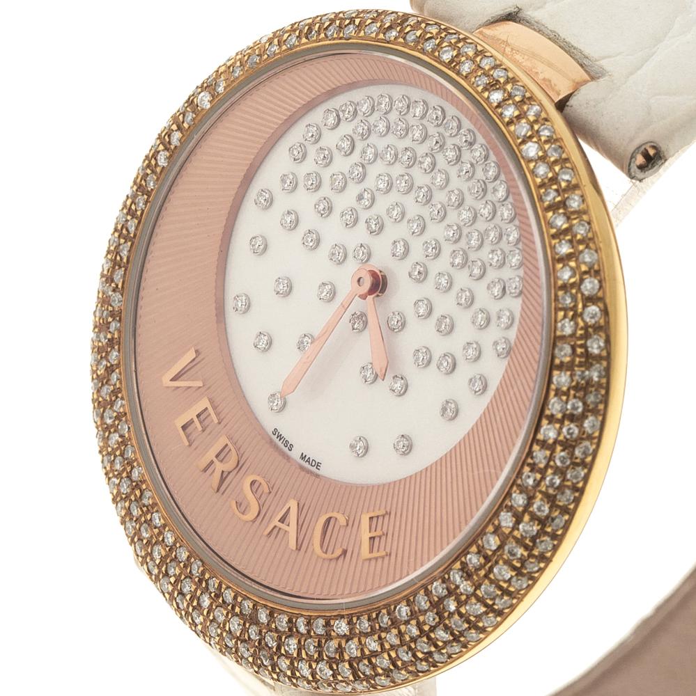 A perfect combination of casual chi and glamorous style, this stunning Versace Perpetuelle 87Q wristwatch defines the brands versatile style. Constructed in cream leather bracelet and rose gold plated steel case, this beautiful watch is further