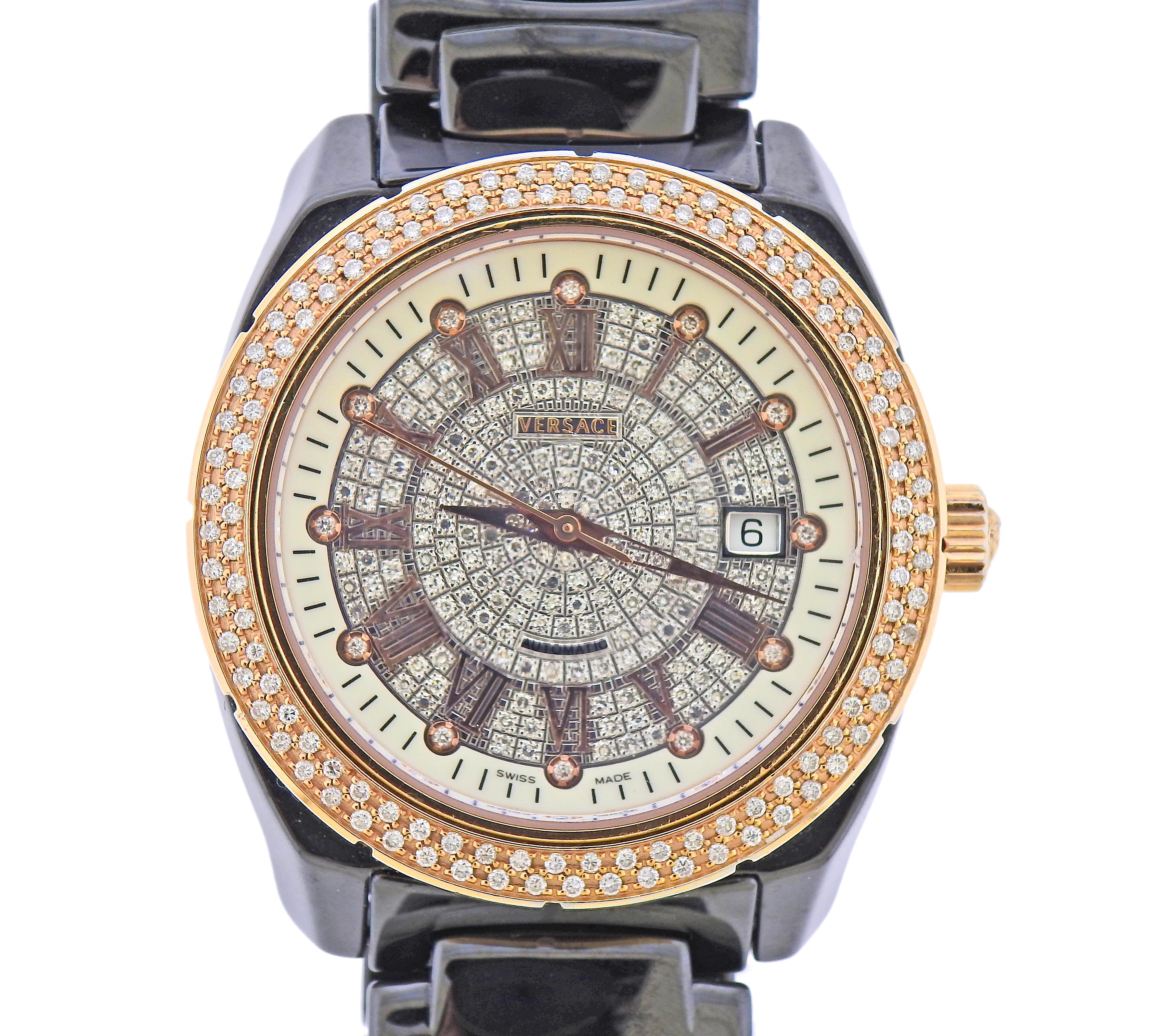 18k rose gold bezel and black ceramic band Versace watch, decorated with full diamond dial and bezel, date window at 3 o'clock, and Roman numerals. Automatic movement with skeleton back. Case is 40.5mm in diameter. Band will fit up to 7.5