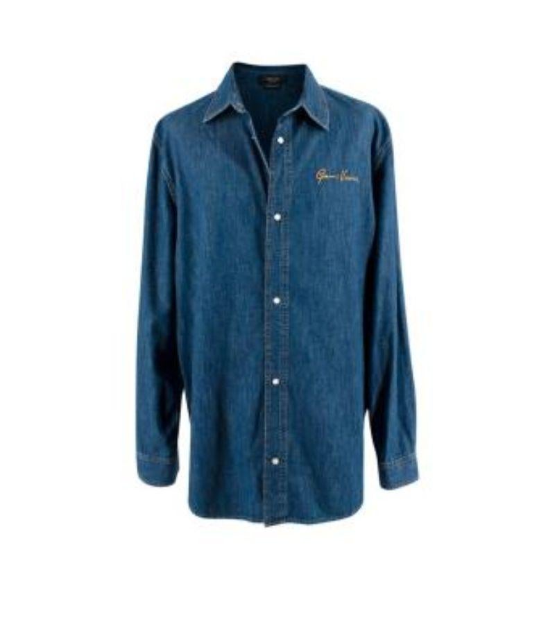 Versace Embroidered Denim Shirt

- Heritage fit
- Button fastening
- Buttoned cuffs
- 'Gianni Versace' embroidery on chest
- Medium-weight construction

Material
100% Cotton

Made in Italy

PLEASE NOTE, THESE ITEMS ARE PRE-OWNED AND MAY SHOW SIGNS