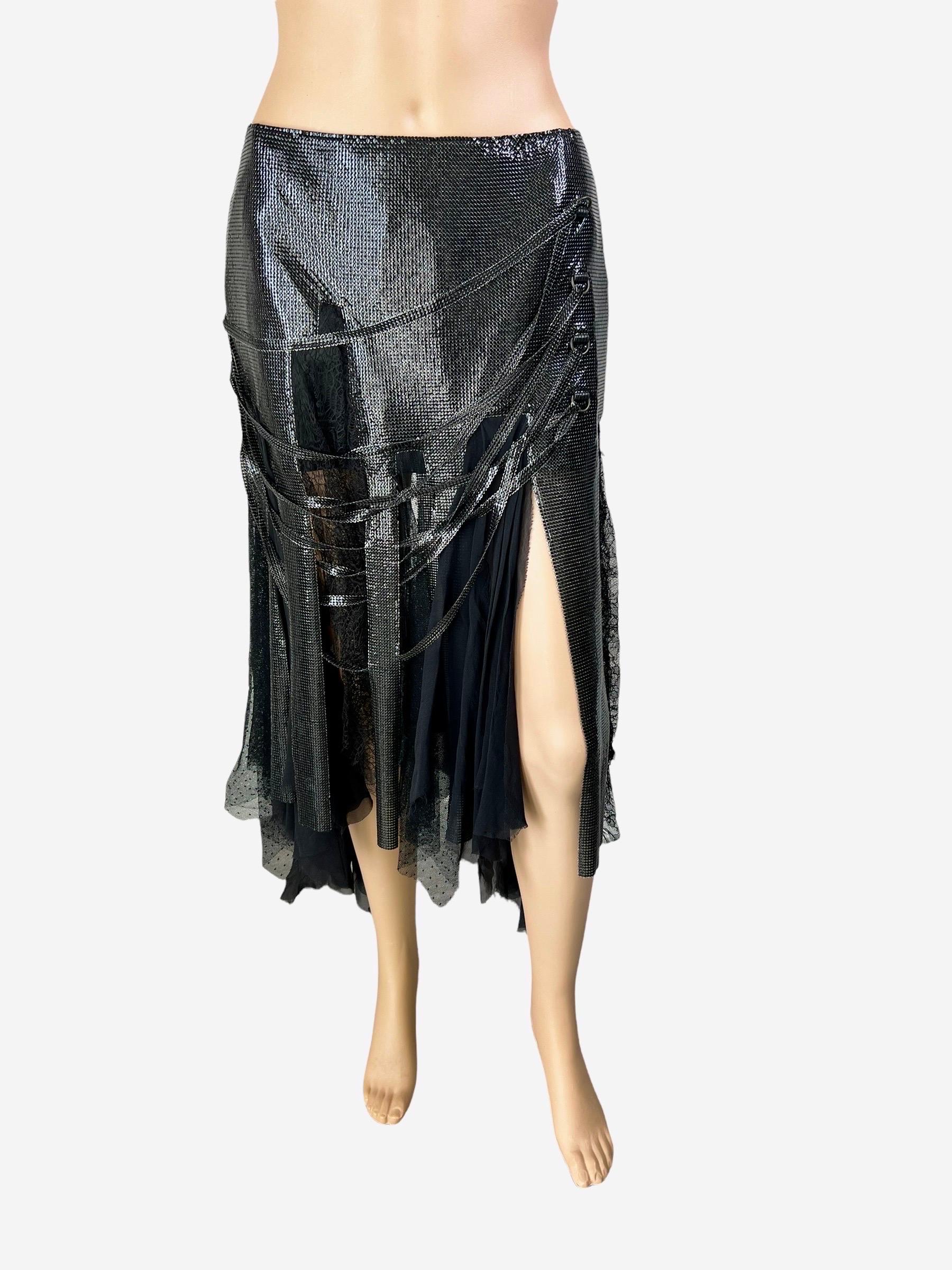 Versace F/W 2003 Runway Oroton Metal Mesh Chainmail Black Asymmetric Skirt Size IT 42

Black Versace Oroton asymmetric midi skirt with metal mesh paneling at hips, sheer and lace fringe panels at hem and concealed zip closure at back.

FOLLOW US ON