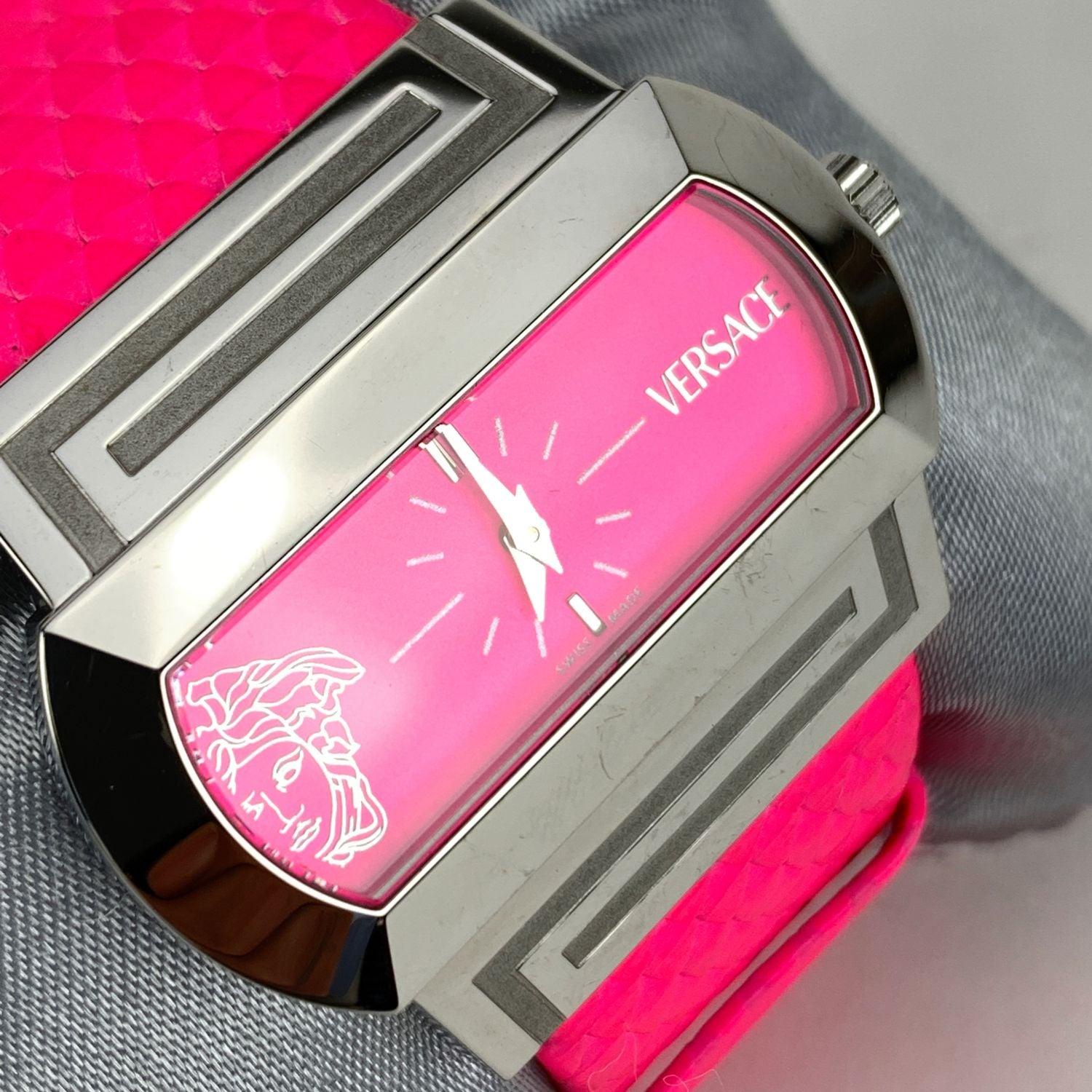 Versace stainless steel watch, Mod. Hippodrome PSQ 99. Stainless steel case. Fluo fuchsia pink dial with Medusa logo on the left and Versace signature on the right. Sapphire crystal. Swiss Made Quartz movement. Water Resistant to 3 atm. Adjustbale