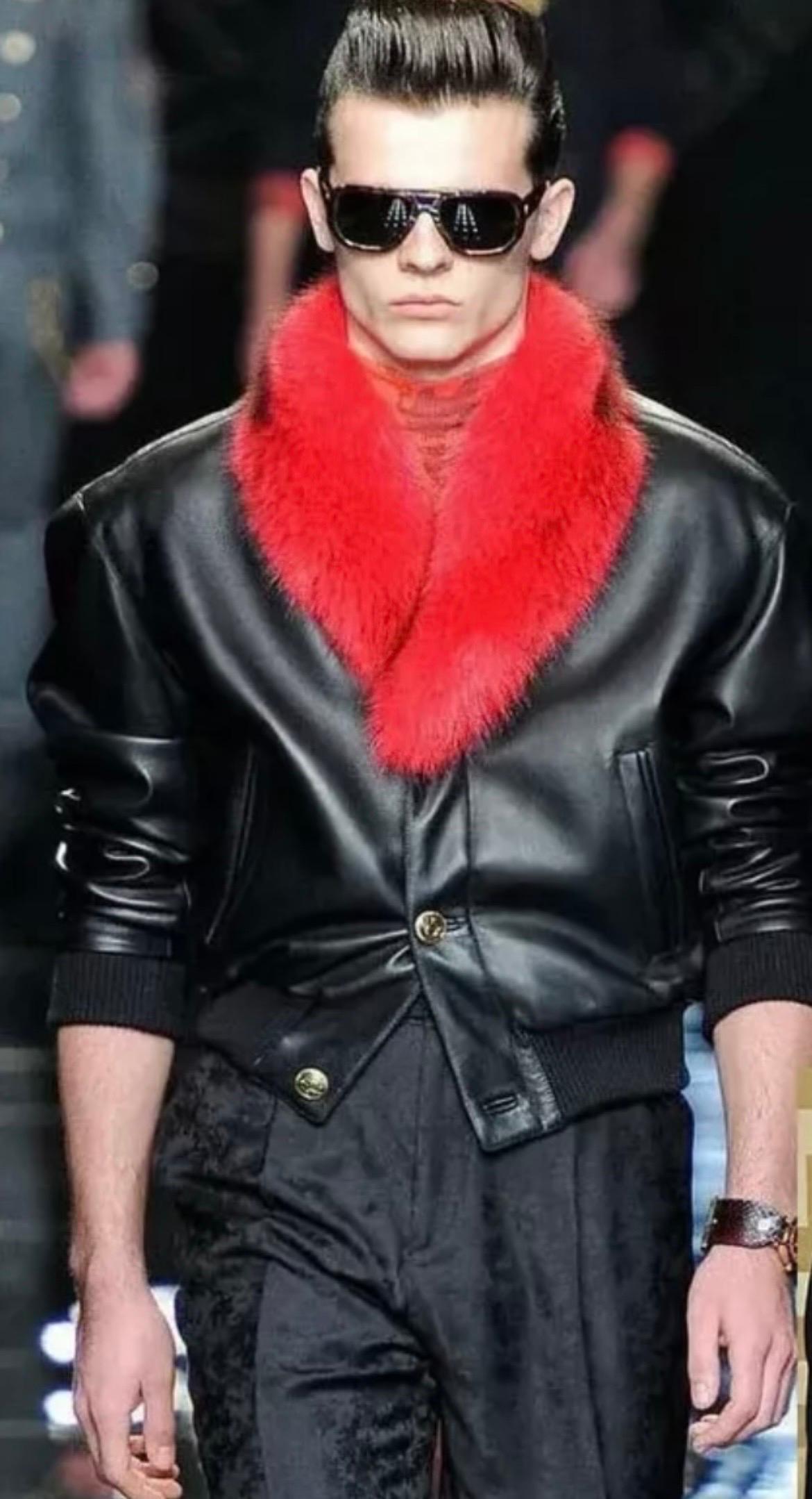 VERSACE  
Black leather jacket from Versace featuring marmotte fur collar, rabbit fur lining, 
gold tone Medusa buttons, 
two side pockets,
ribbed knit cuffs and hem.
Italian size is 48 or US 38
100% leather
Made in Italy
Brand new