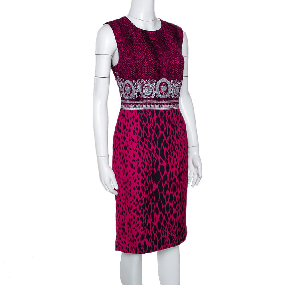 Stay in style with this trendy Versace dress that lends confidence and poise. It is crafted from a blend of quality fabrics and features a mix of animal and Baroque print that adds interest. It is tailored to offer a good fit and the silhouette