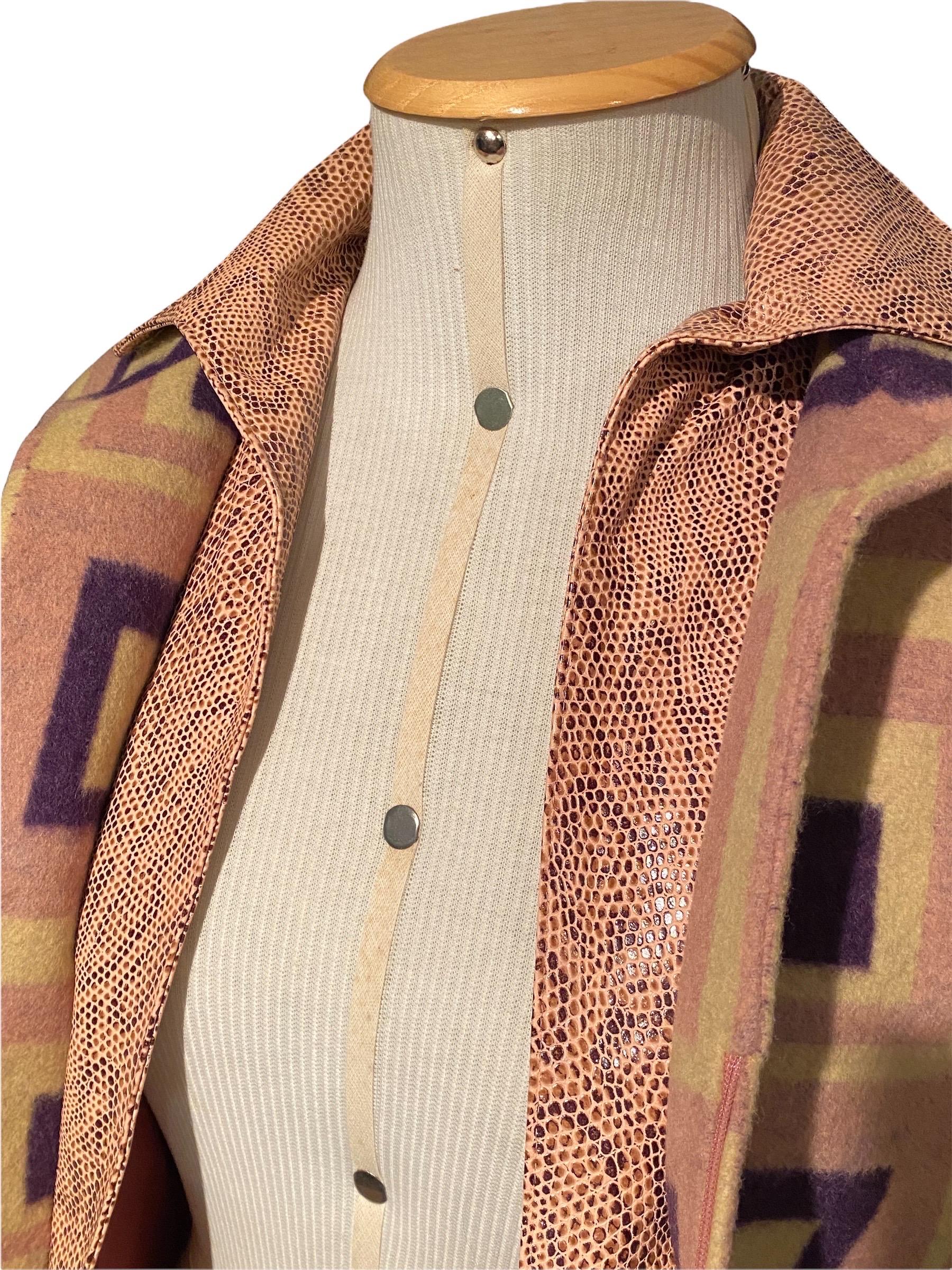 FW 2000 runway snakeskin-trim wool jacket. Worn by one and only Amber Valletta in the Ad Campaign. 

Double collar
Geometric pattern - yellow and purple on pink 
Gold Versace Medusa hardware
Zip-Up front
Two front pockets
Silk lining

Pre-owned