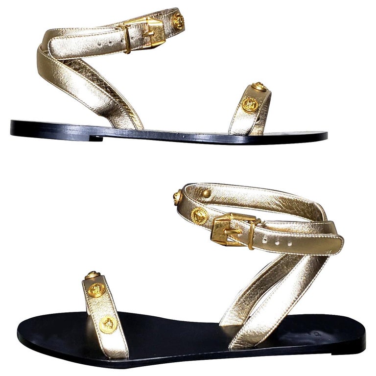 VERSACE GOLD LEATHER FLAT SANDALS with GOLD MEDUSA STUDS 36.5, 37.5, 38 For  Sale at 1stDibs