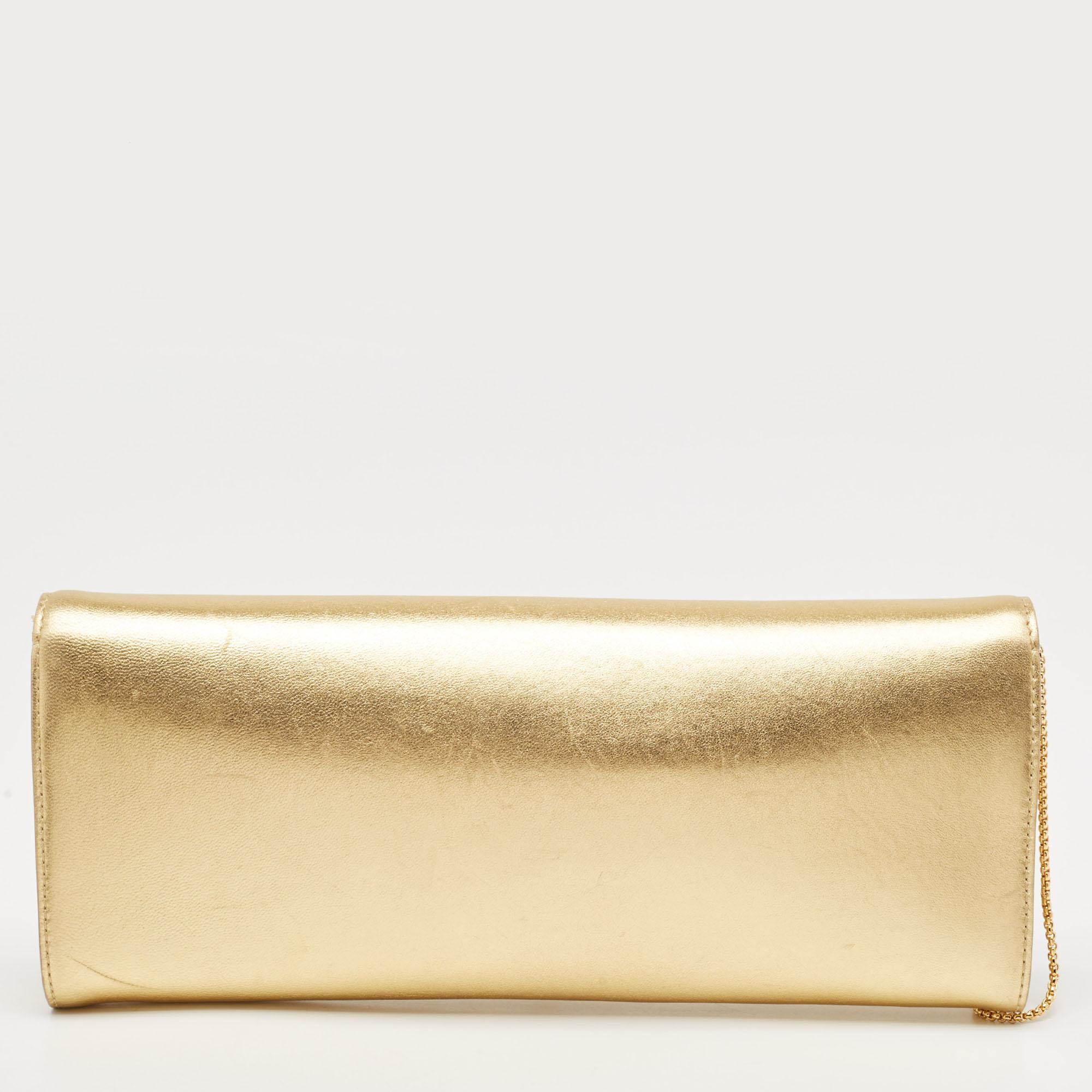 Functional and fashionable, this clutch is a classy styling choice. It is crafted from quality materials, and its lined interior will keep your evening essentials in a neat way.

Includes: Info Booklet, Brand Tag, Detachable Chain Strap

