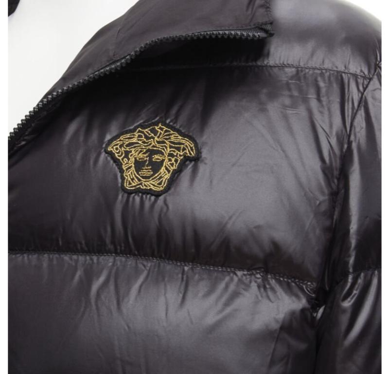VERSACE gold Medusa badge black goose down duvet puffer jacket IT50 L
Reference: TGAS/C00616
Brand: Versace
Designer: Donatella Versace
Model: A87026S A235216 A1008
Material: Goose Down, Nylon
Color: Black
Pattern: Solid
Extra Details: Black nylon