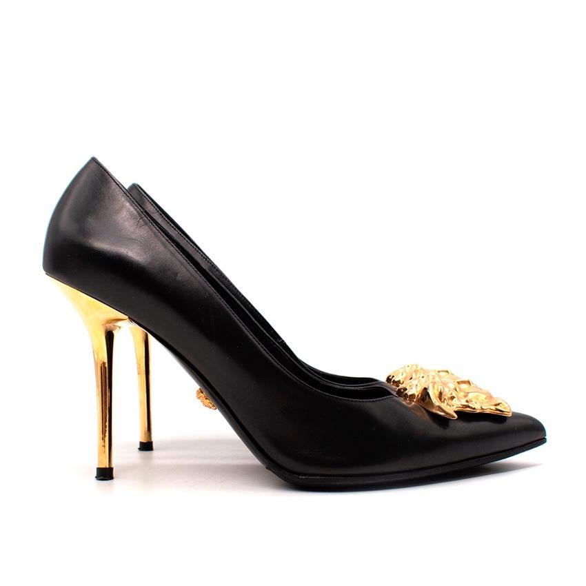 Versace Gold Medusa Black Pointed Gold-Tone Heeled Pumps
 

 - Smooth black calf leather upper, with point toe
 - Decorative gold-tone metal 3-D Medusa head on toe-box, and coordinating stiletto heel
 

 Materials 
 Leather 
 

 Made in Italy
 

