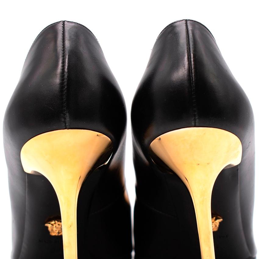versace black and gold heels