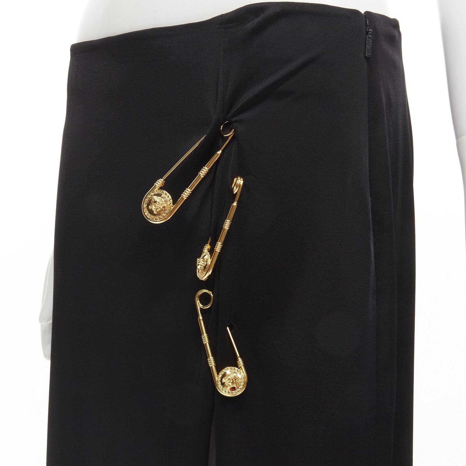 VERSACE gold Medusa safety pin black viscose high slit skirt IT42 M
Reference: TGAS/C00821
Brand: Versace
Designer: Donatella Versace
Model: A83760 A223485 A1008
Material: Viscose
Color: Black, Gold
Pattern: Solid
Closure: Zip
Extra Details: Medusa