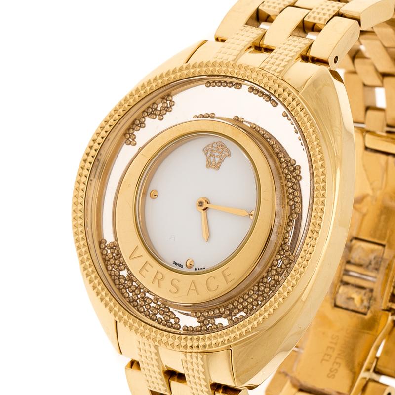 This beautiful timepiece from the house of Versace is sure to be a conversation starter with its eclectic and eye-catching design. Constructed in gold plated stainless steel bracelet and case, this Destiny Spirit 86Q watch features a transparent