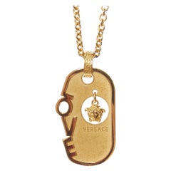 VERSACE gold tone nickel Love hanging Mesuda dog tag plate necklace