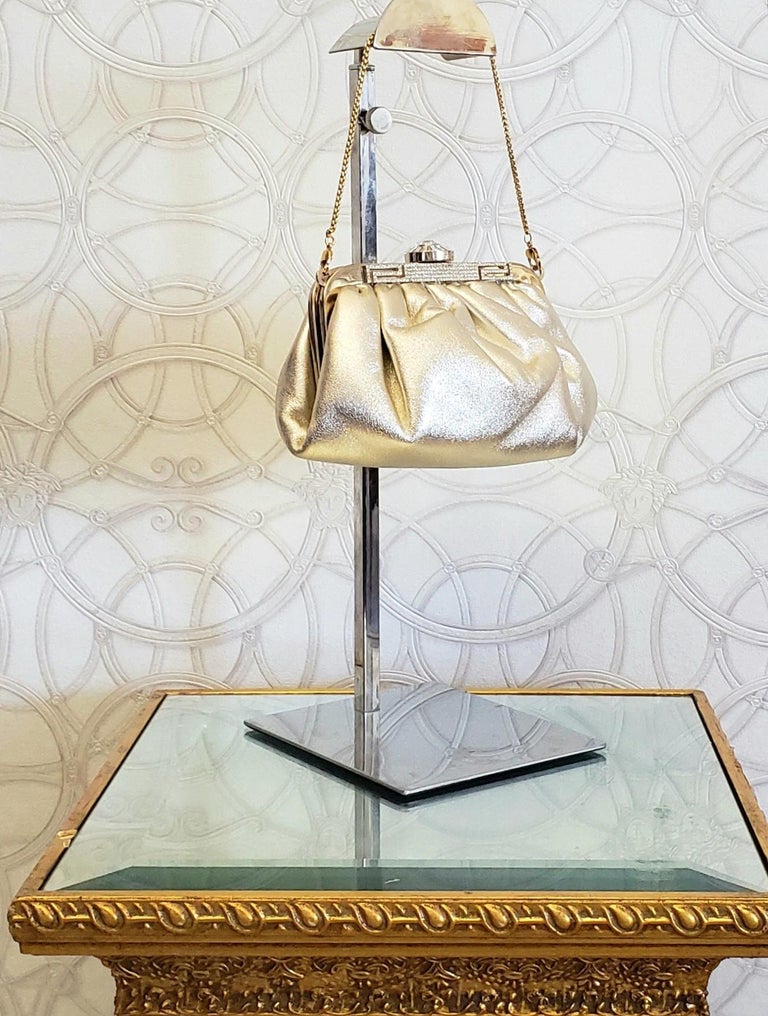 VERSACE GOLDEN LEATHER CLUTCH BAG EMBELLISHED with RHINESTONES at 1stDibs