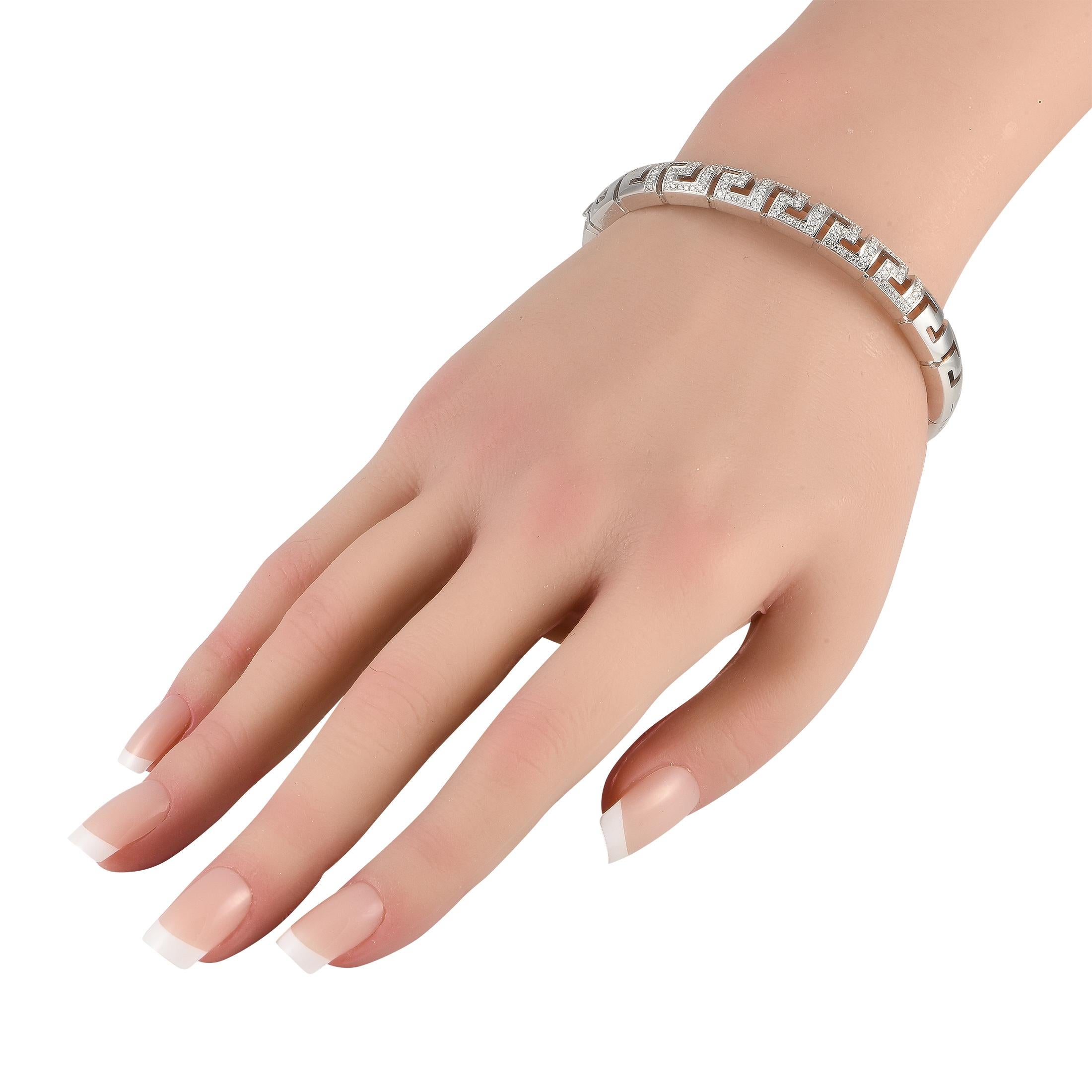 Versace's Greca motif is all over this white gold bangle bracelet. The Greek key pattern, which symbolizes infinity and unity, makes up the entire circumference of the bangle. All come in a flawlessly polished finish, except for a short row detailed