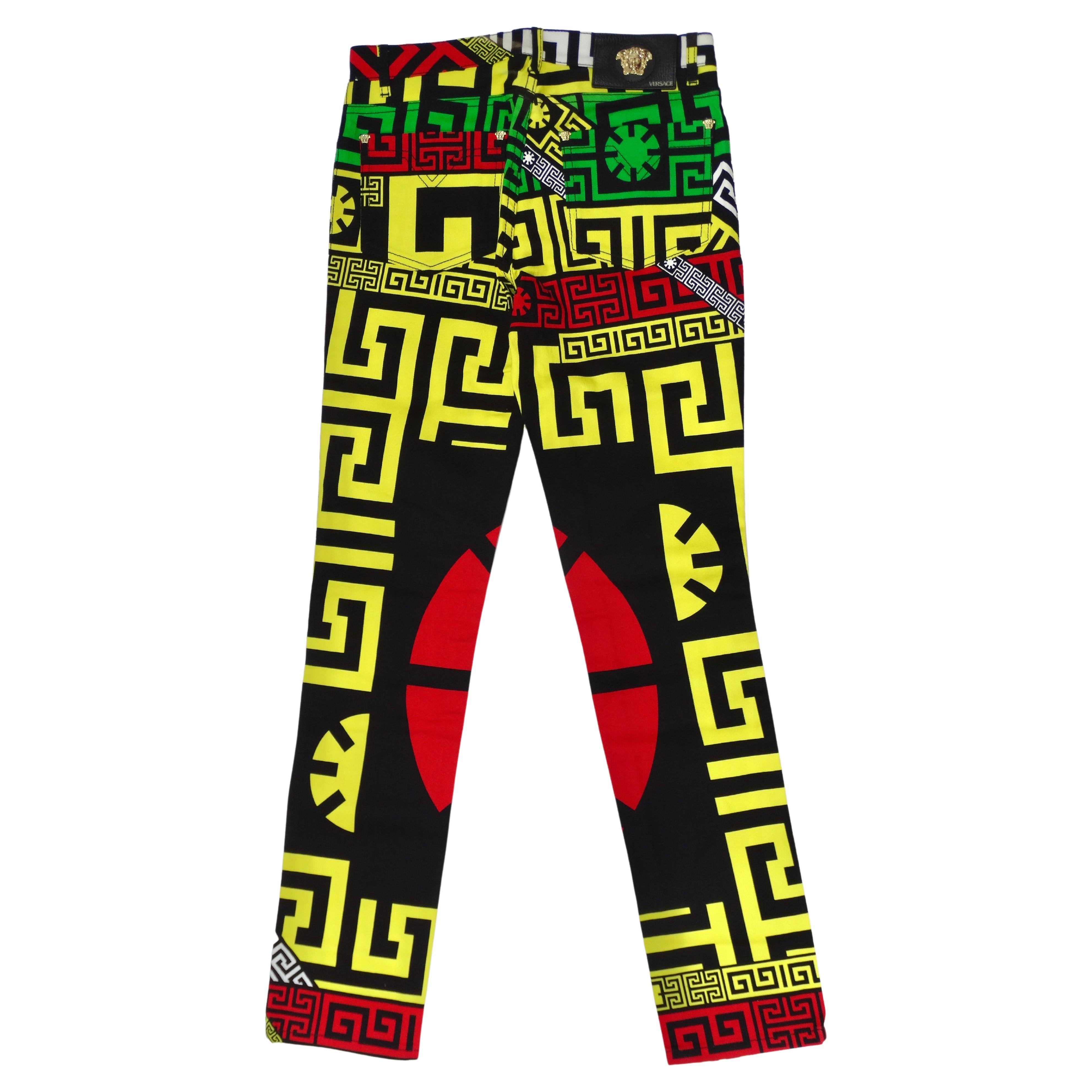 Everyone needs a pair of statement pants in their wardrobe! These Versace jeans speak for themselves. They are featured in a slightly stretch cotton, red, green, and yellow new #GREEK Puzzle print, button closure, skinny fit, and button closure. New
