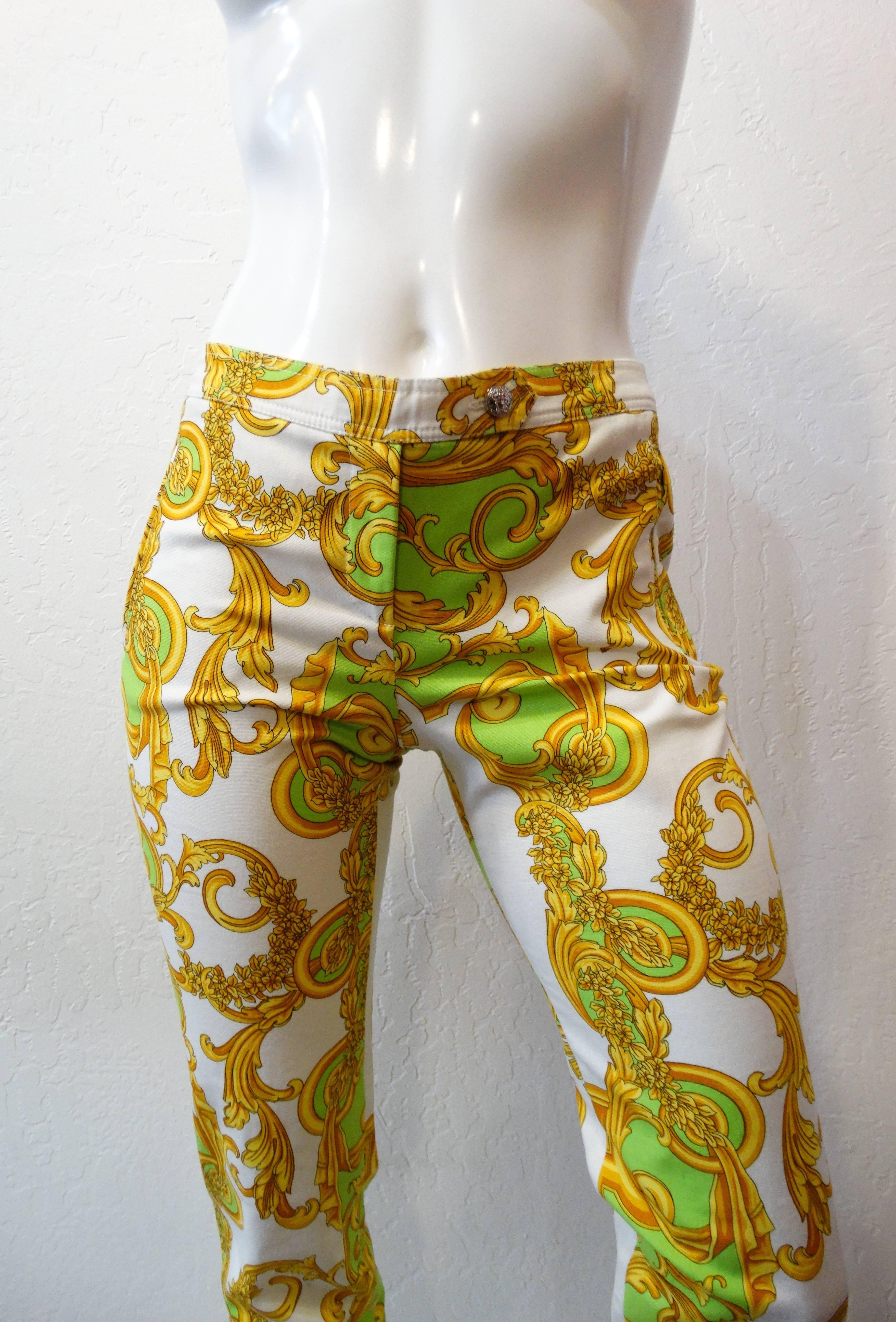 If it ain't Baroque don't fix it! Rock some print with out 1990s Versace Baroque printed pants! Bright green, cream and gold swirling print on woven cotton pants. Mid rise fit with a slightly flared leg. Silver medusa head button closure at the
