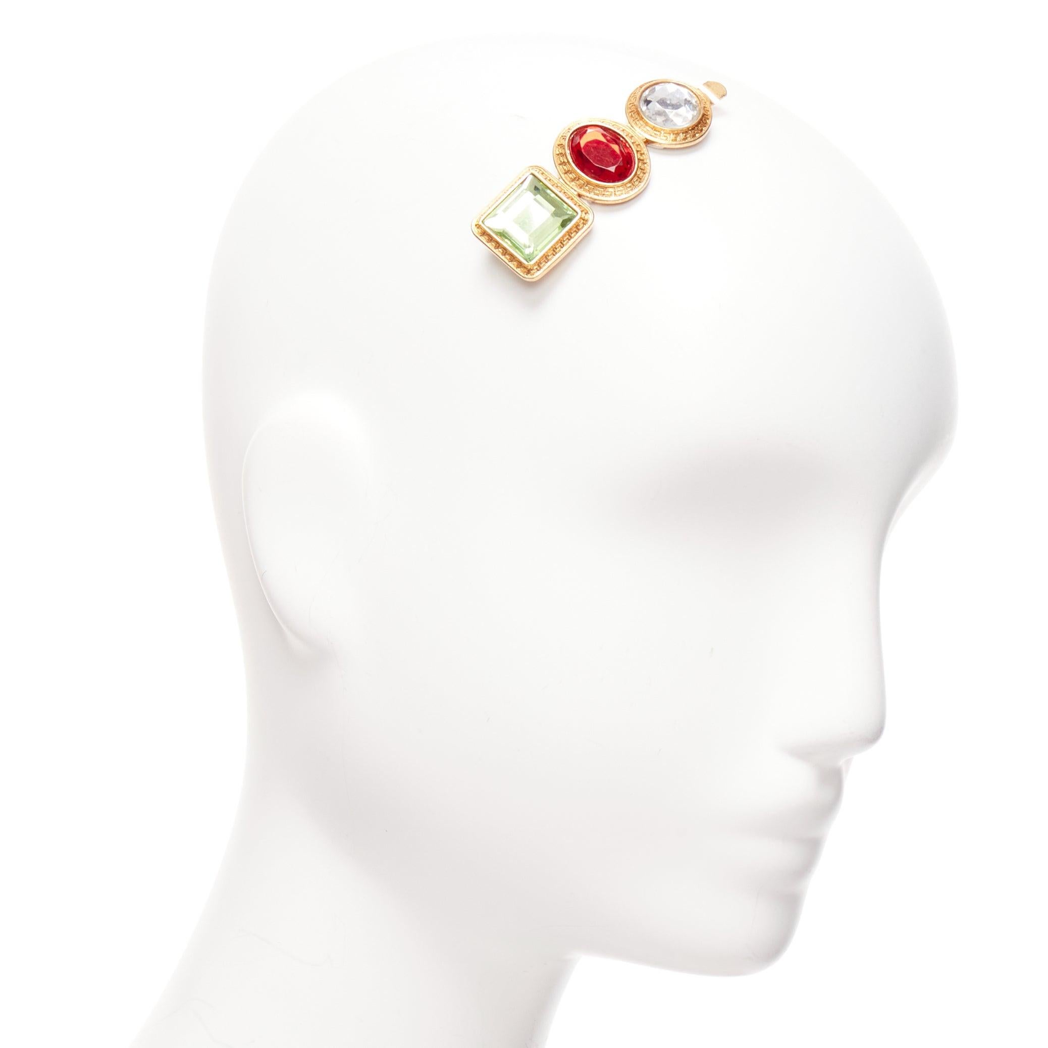 VERSACE green red clear crystal gold baroque jewelled single hairclip
Reference: AAWC/A01007
Brand: Versace
Designer: Donatella Versace
Material: Acrylic, Metal
Color: Red, Green
Pattern: Barocco
Closure: Clip On
Lining: Gold Metal
Made in: