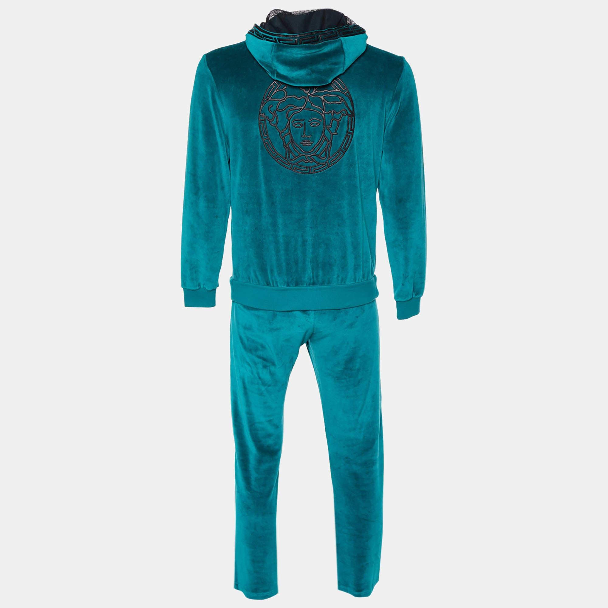 Opt for a comfortable style with this track suit from Versace. It comes in green with a long sleeve hoodie jacket and comfortable matching pants.

