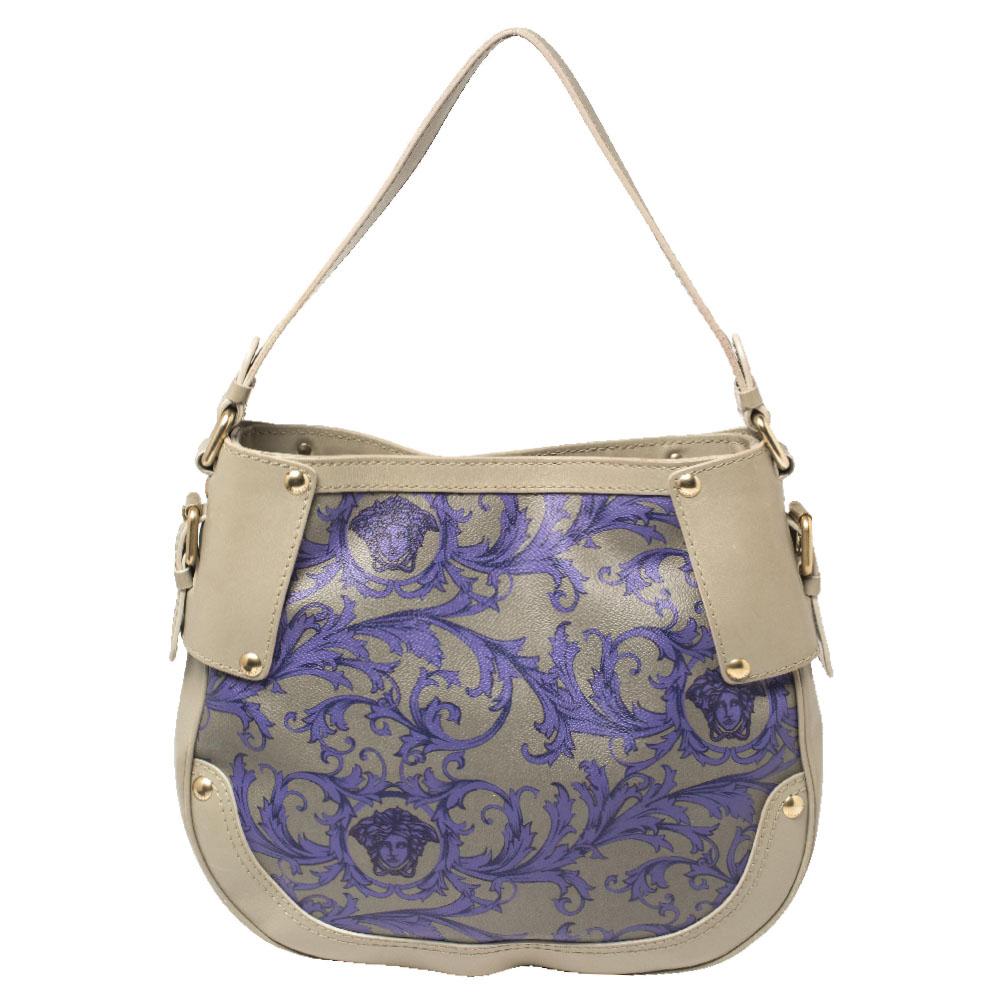 Expertly designed from leather, this pretty hobo is adorned with a majolica print all over and the iconic Medusa logo at the front. The interior is lined with fabric, making the bag highly durable and functional. High on style, carry this hobo from
