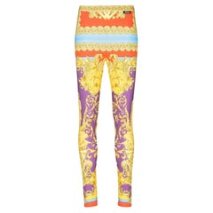 Versace Heritage Legging in dunklem Orchideen- und Sonnenbarockdruck Größe 38